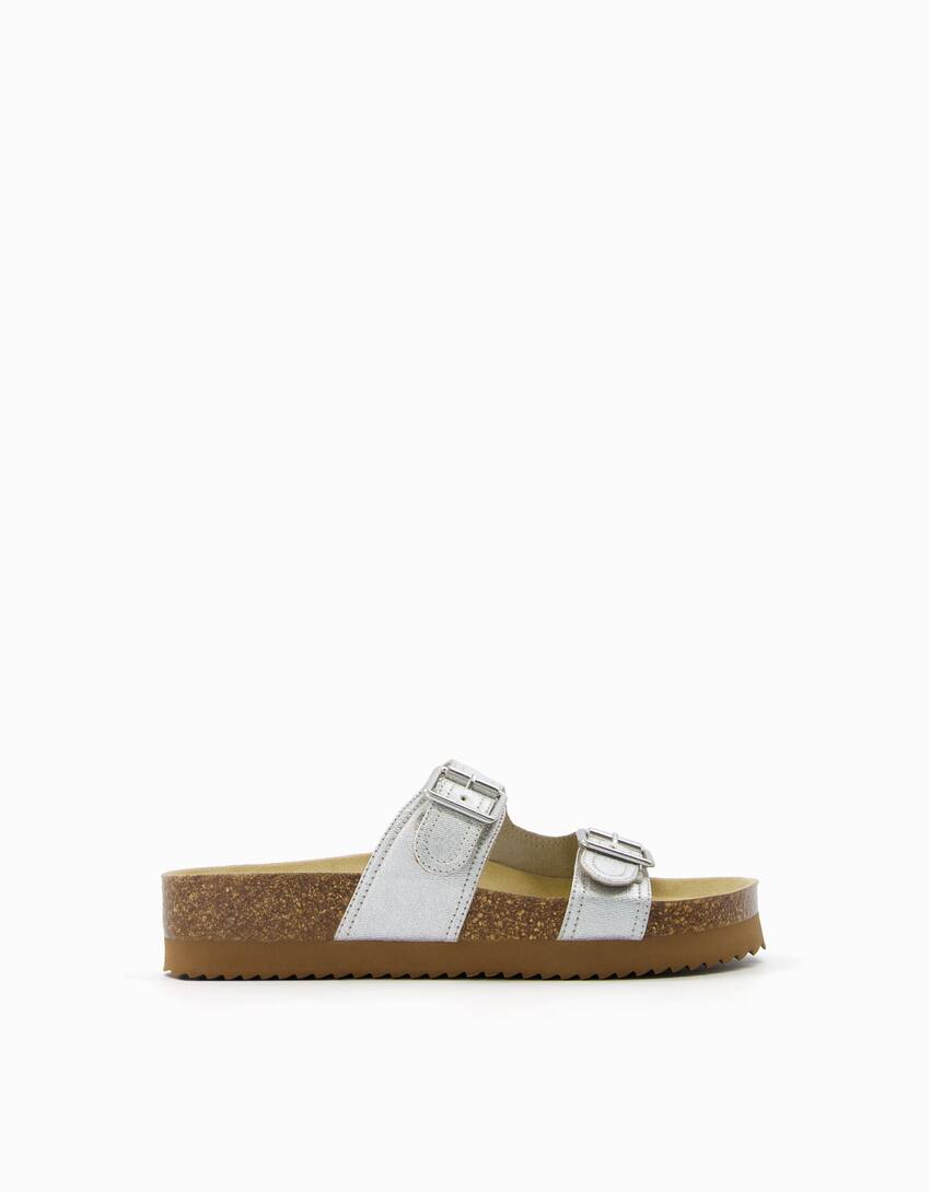 Metallic flat slider sandals with buckles - Women | Bershka