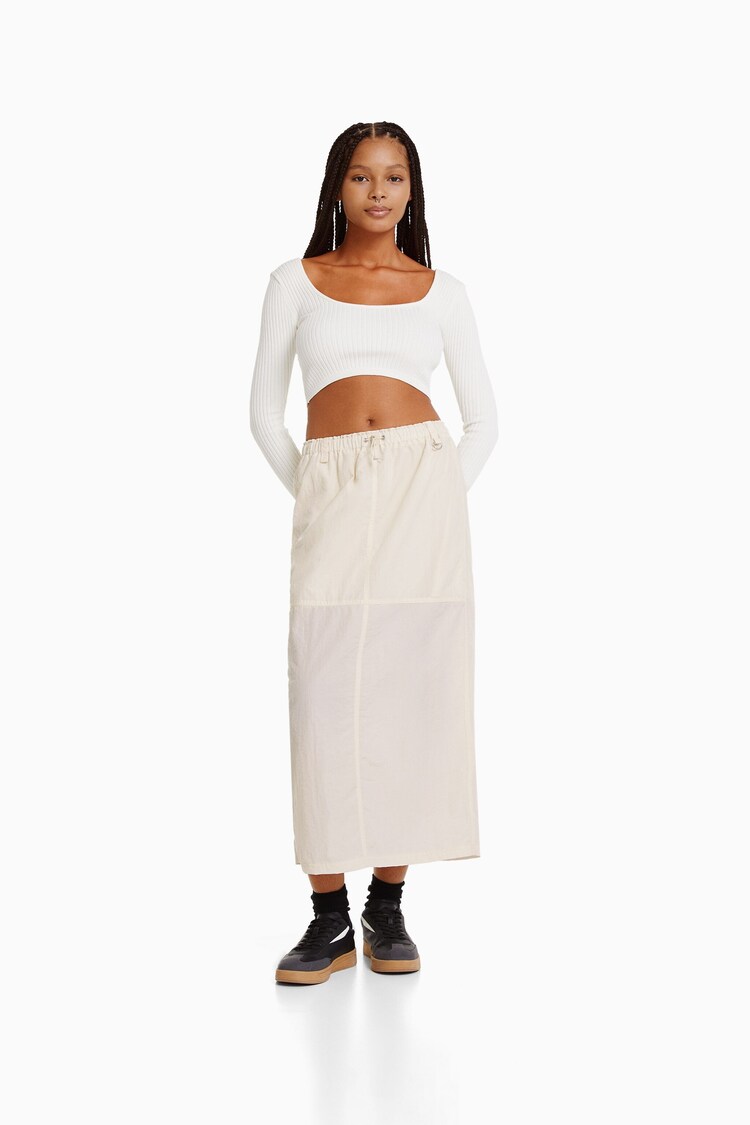 Midi sukňa s nylonovým efektom