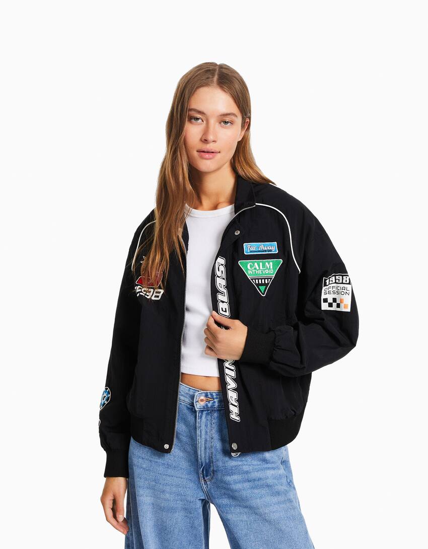 Nylon blend racing jacket with patches - Woman | Bershka