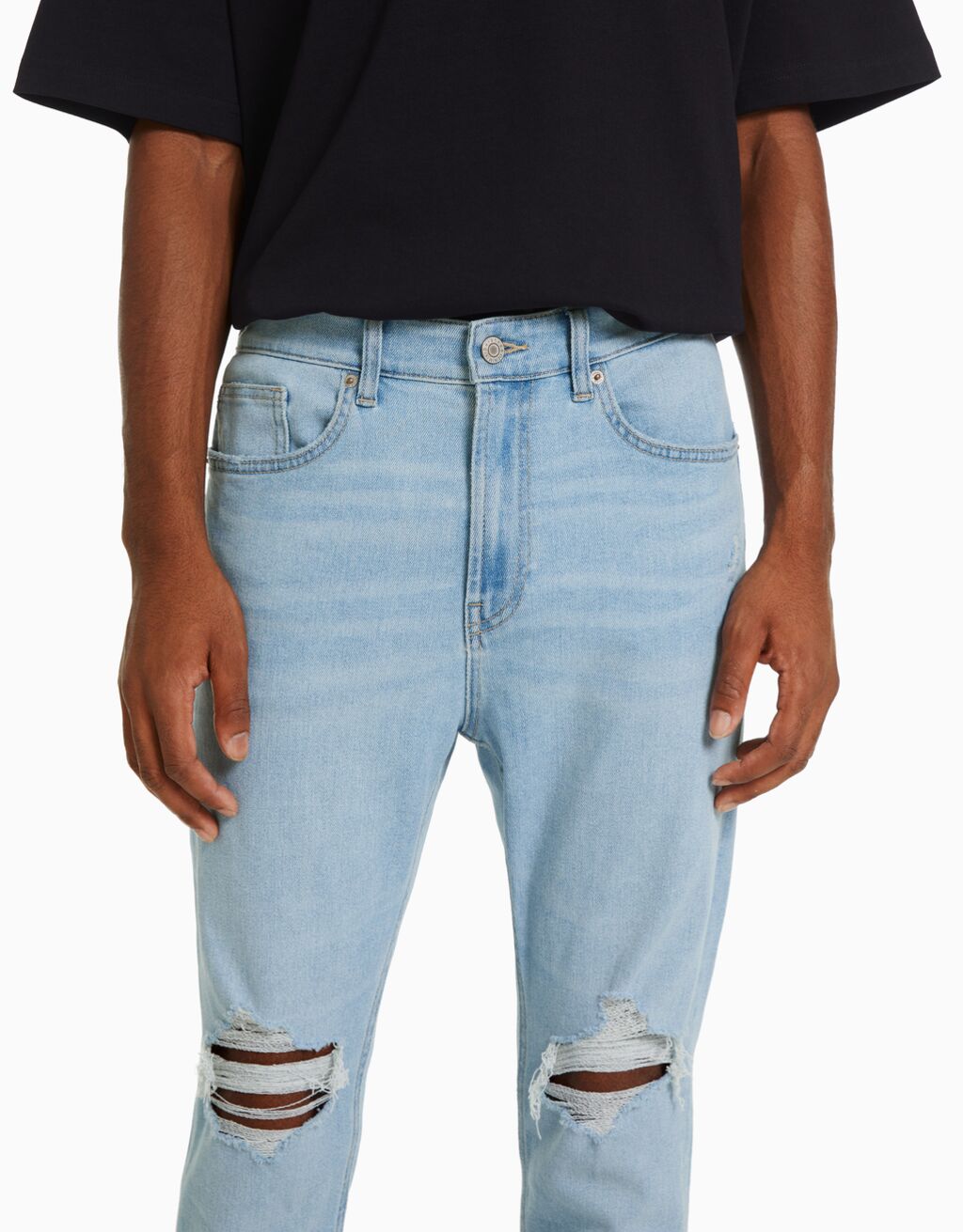 Ripped carrot fit jeans Man Bershka