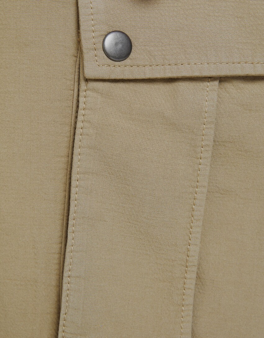 Cotton cargo Bermuda shorts with straps - Women | Bershka