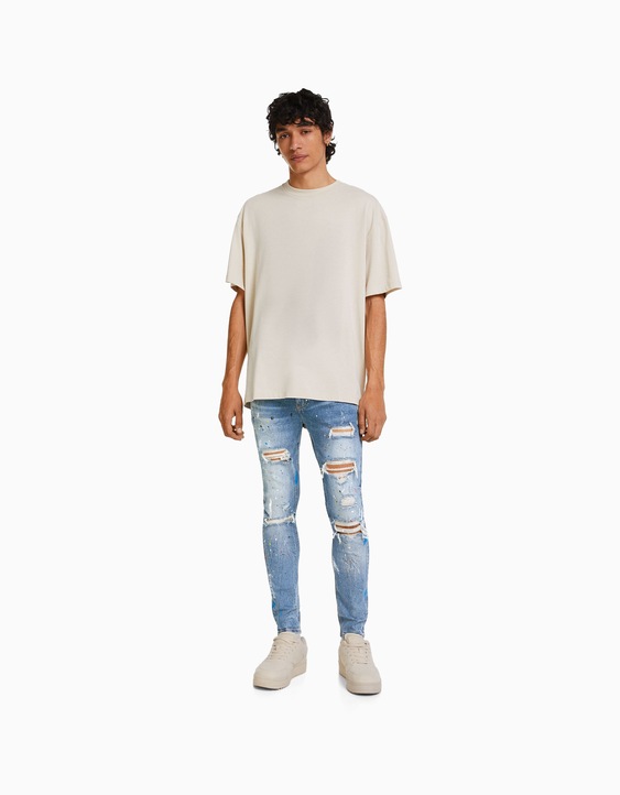 Ripped paint splatter skinny jeans - Jeans | Bershka