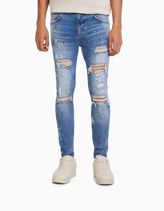 Jeans skinny rotos pintura - Hombre |