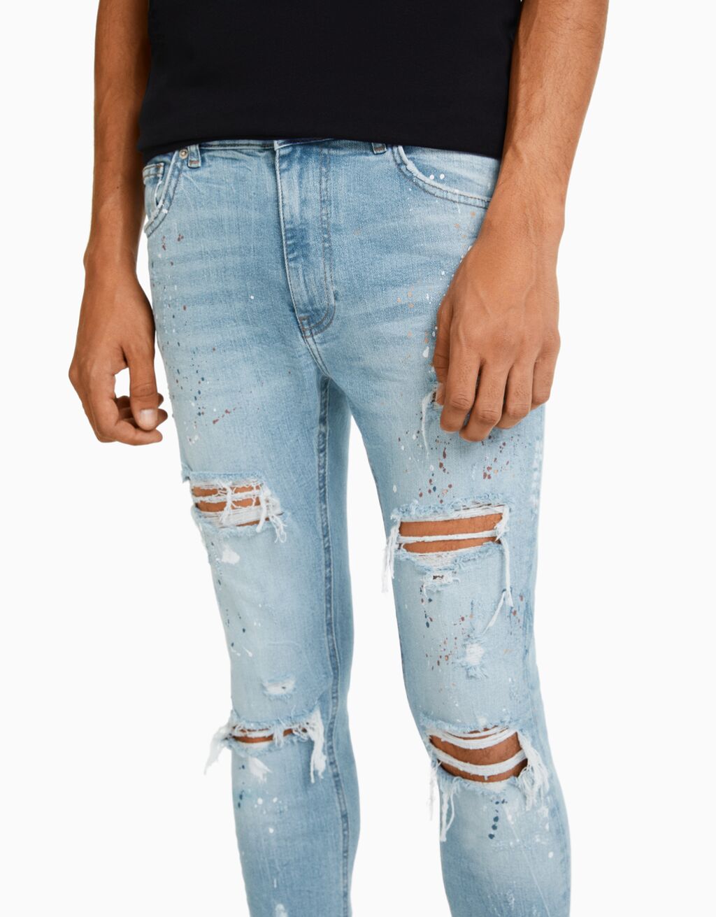 Ripped paint splatter skinny jeans - Man | Bershka
