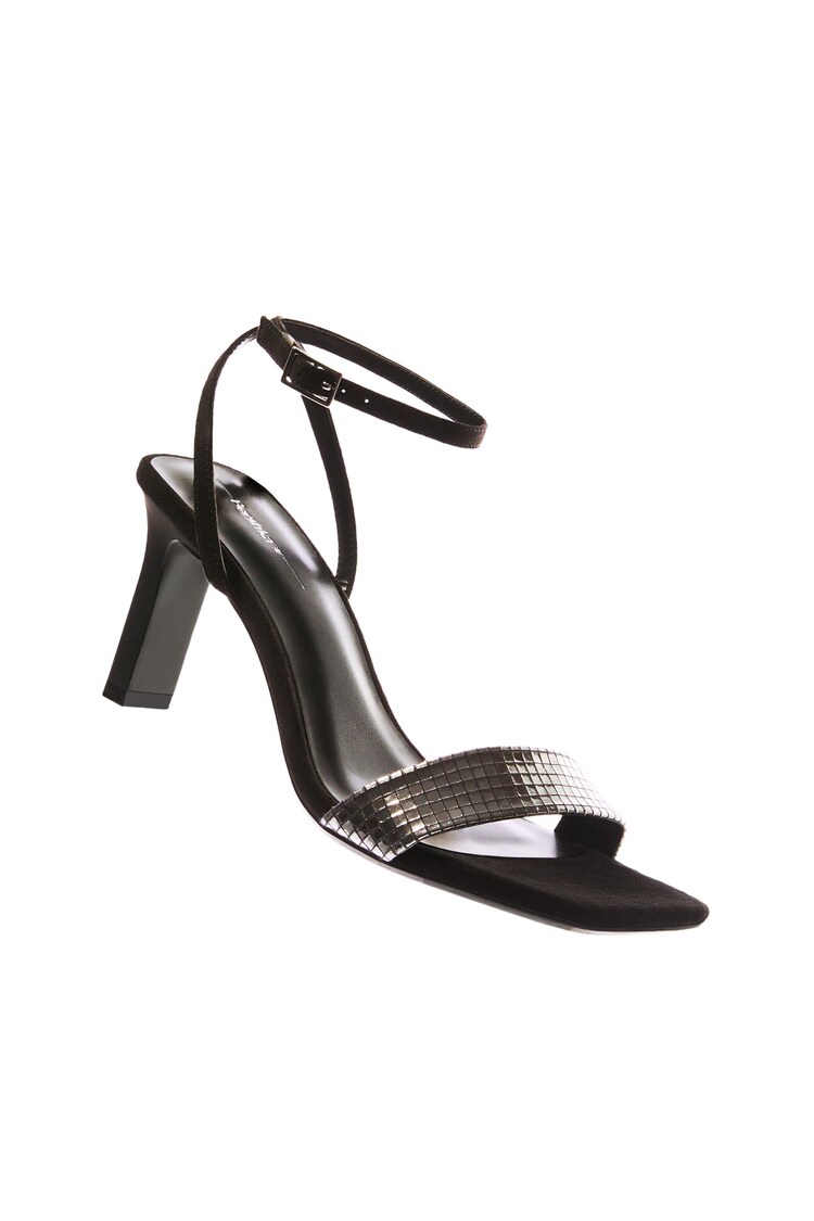 Heeled sandals with an ankle strap and metallic vamp
