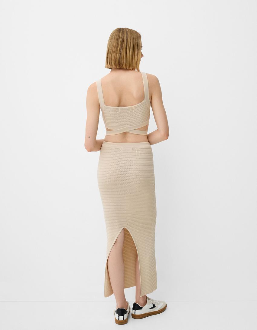 Conxunto top e saia cut out-Area-2