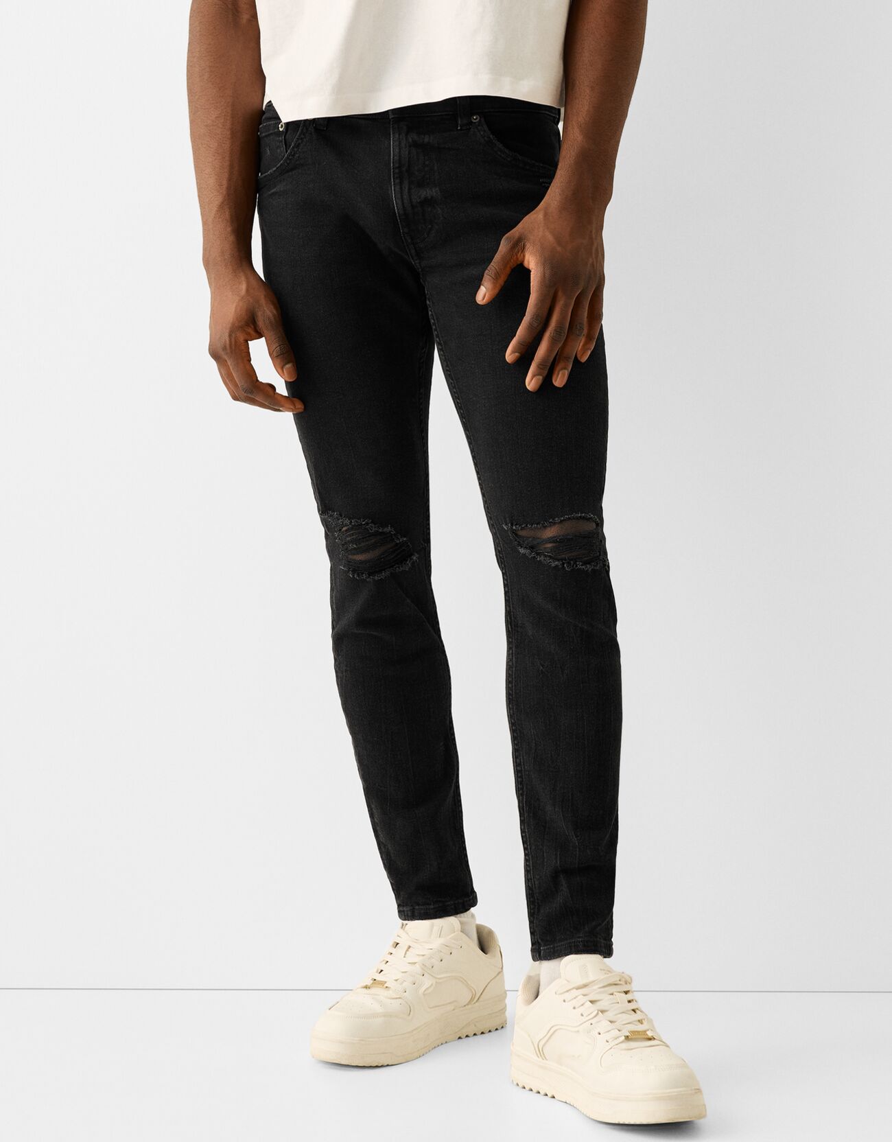 Bershka Skinny Jeans Mit Rissen Herren 44 Schwarz