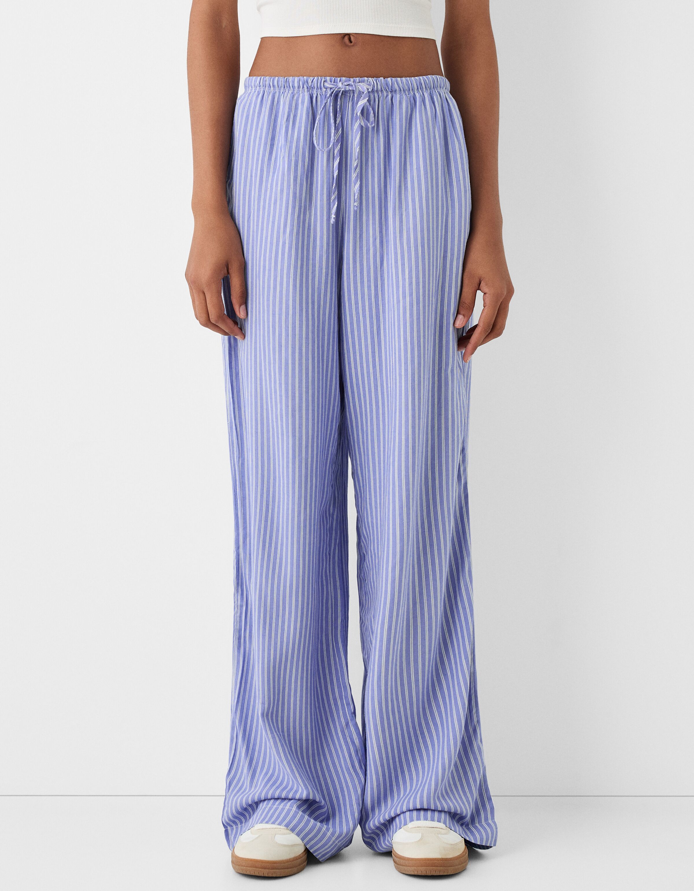 Straight leg striped trousers with elasticated waist Women Bershka