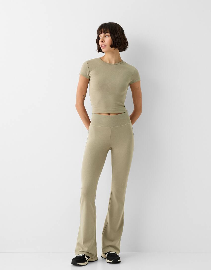 Ribbed waist flared trousers - Women