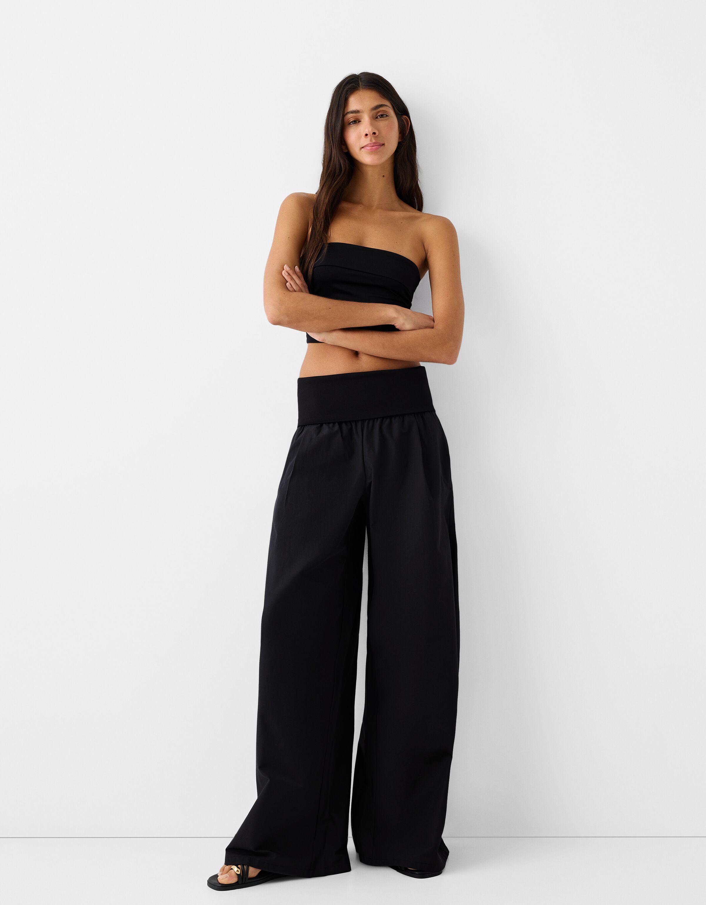 Wide-leg pants with fold-over waist - Women | Bershka