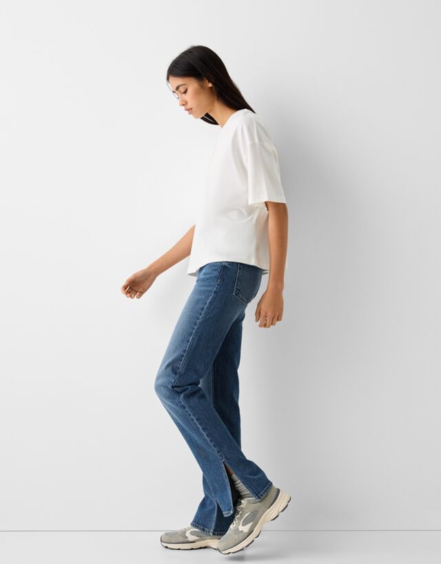 Jeans flare conforto abertura lateral