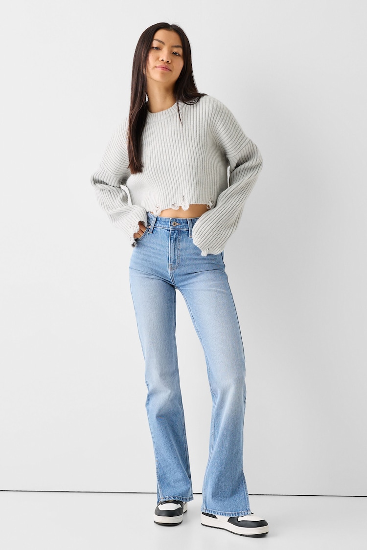 Jeans flare comfort fit spacco laterale