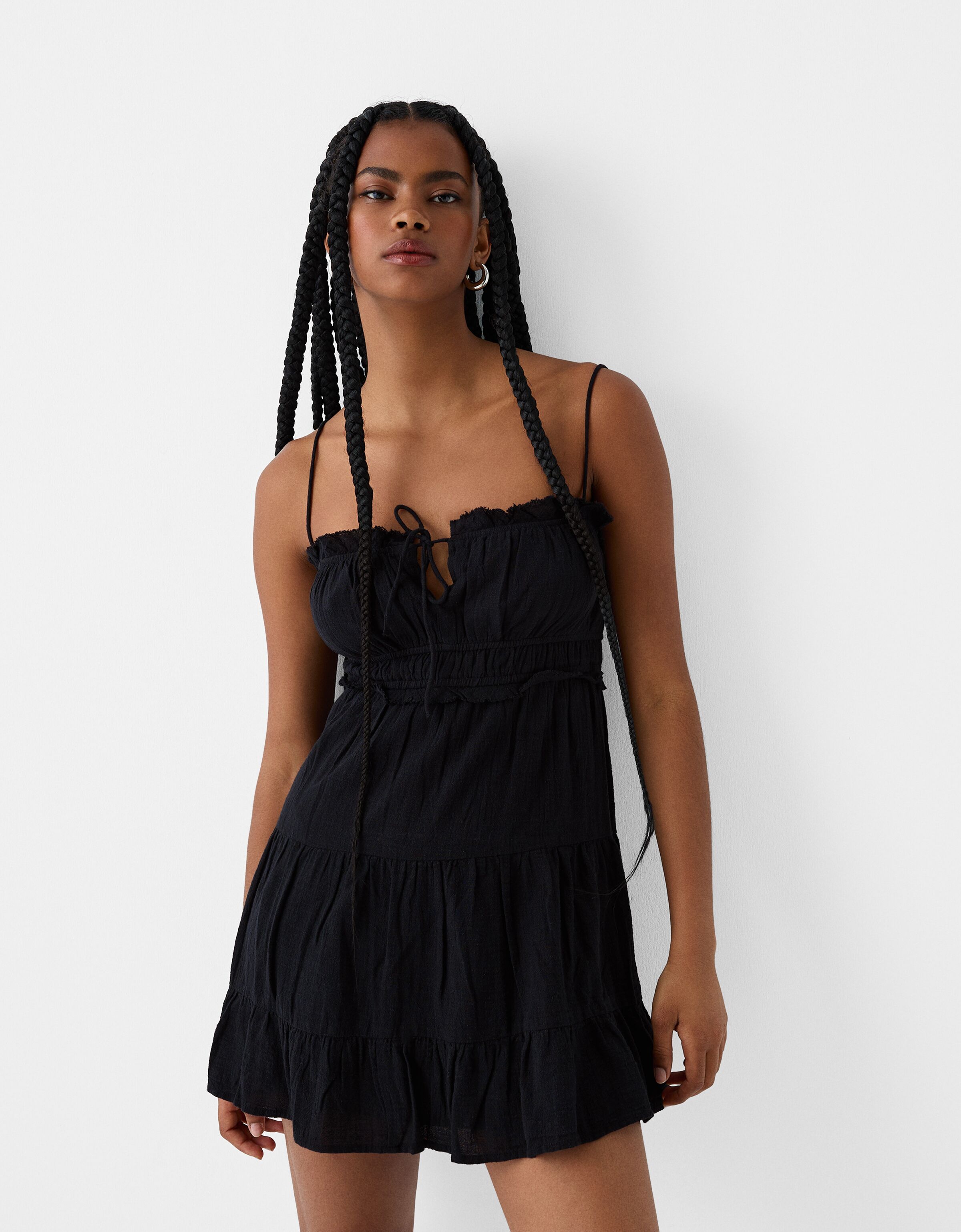 Black ruffle mini dress hotsell