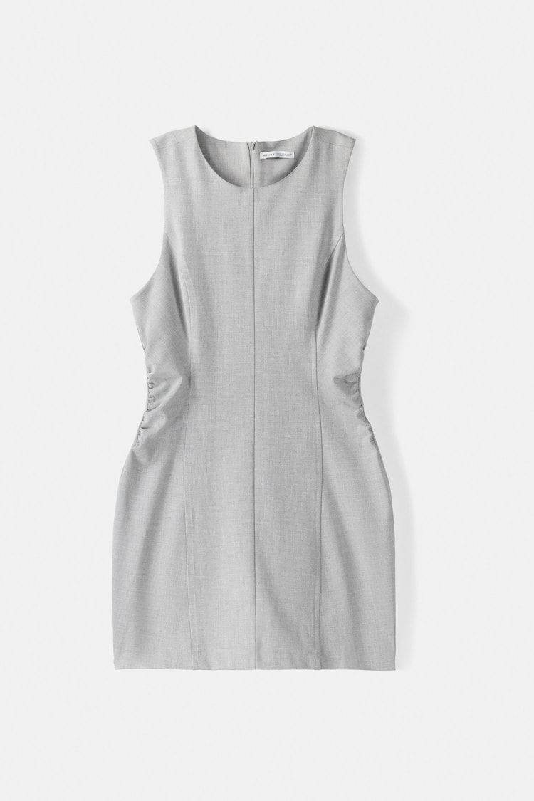 Tailored fitted sleeveless mini dress with seams