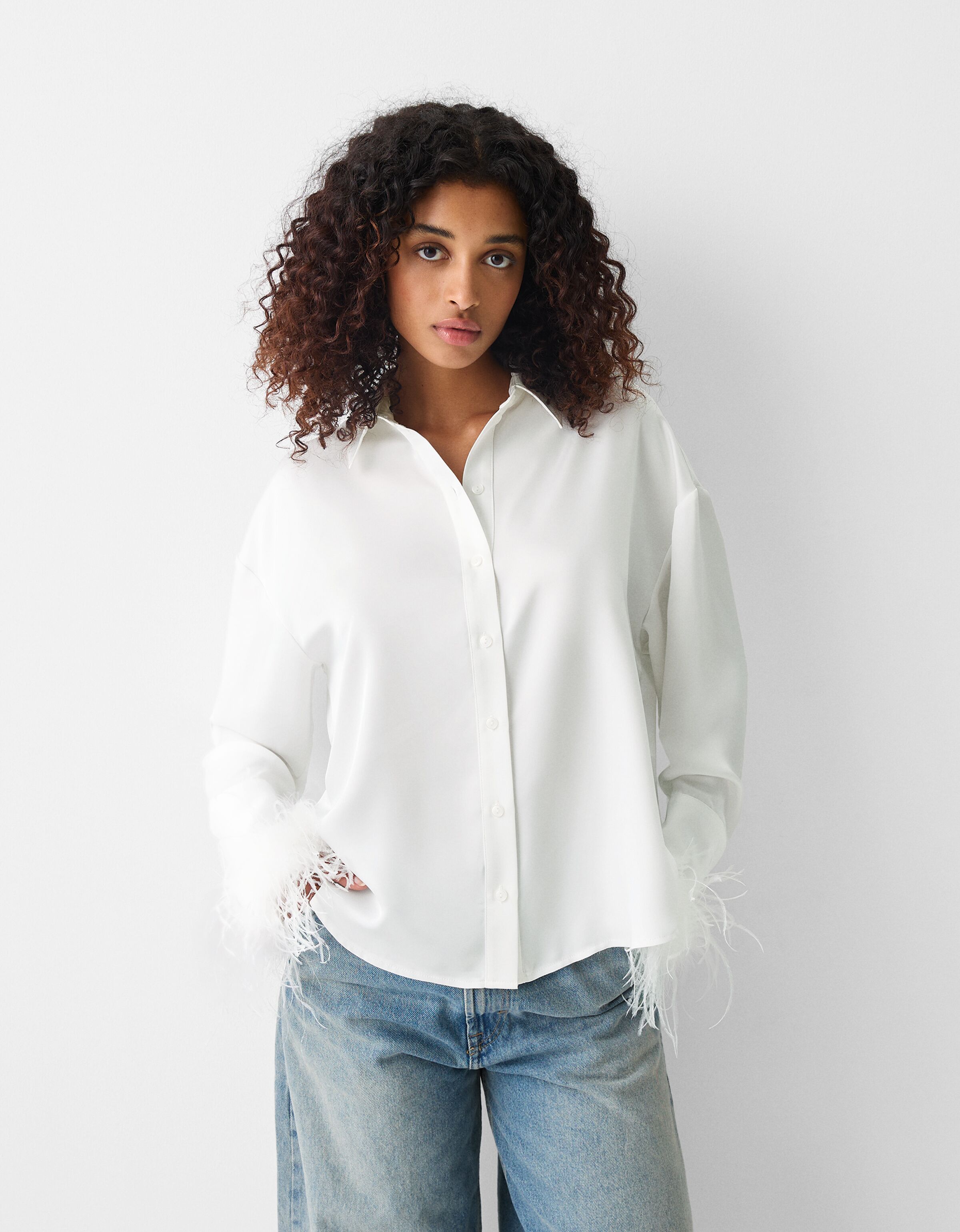 Oversized satin shirt with feather detail