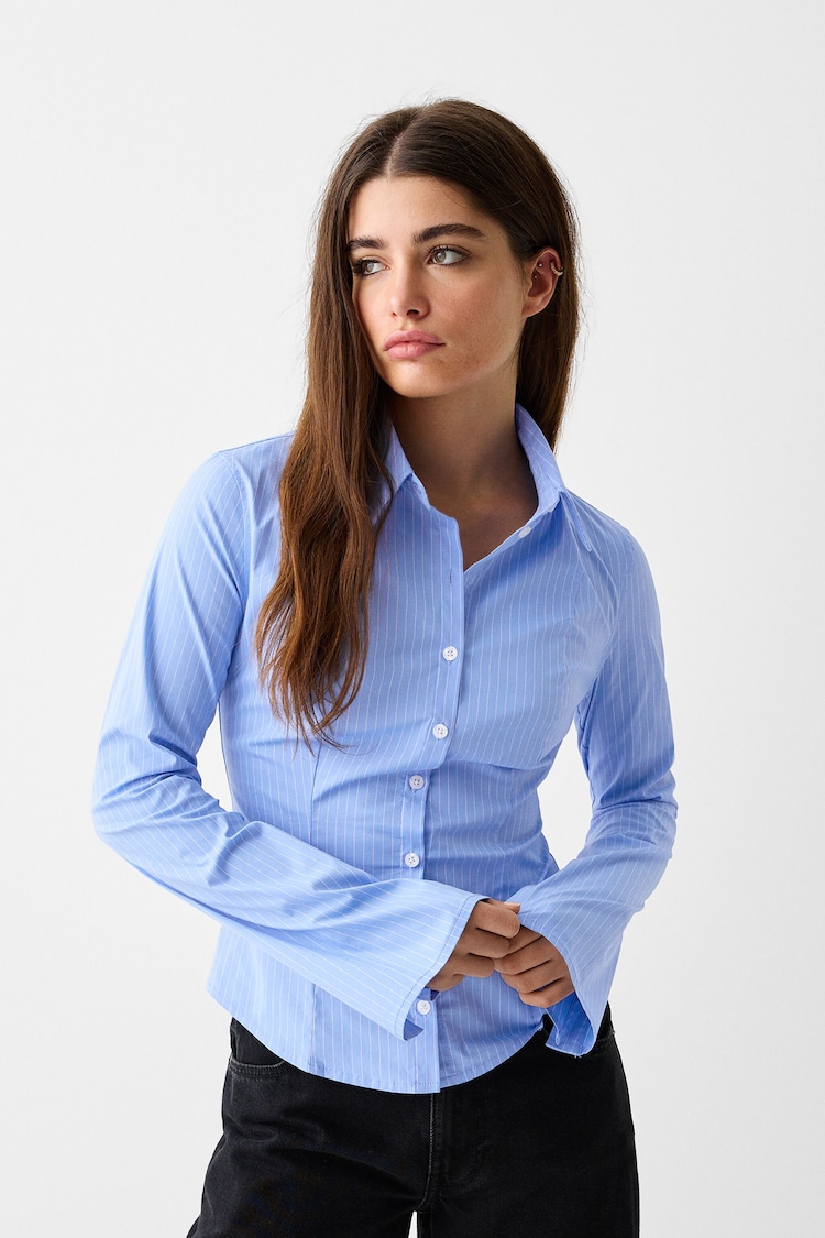 Fitted shirt with flared long sleeves