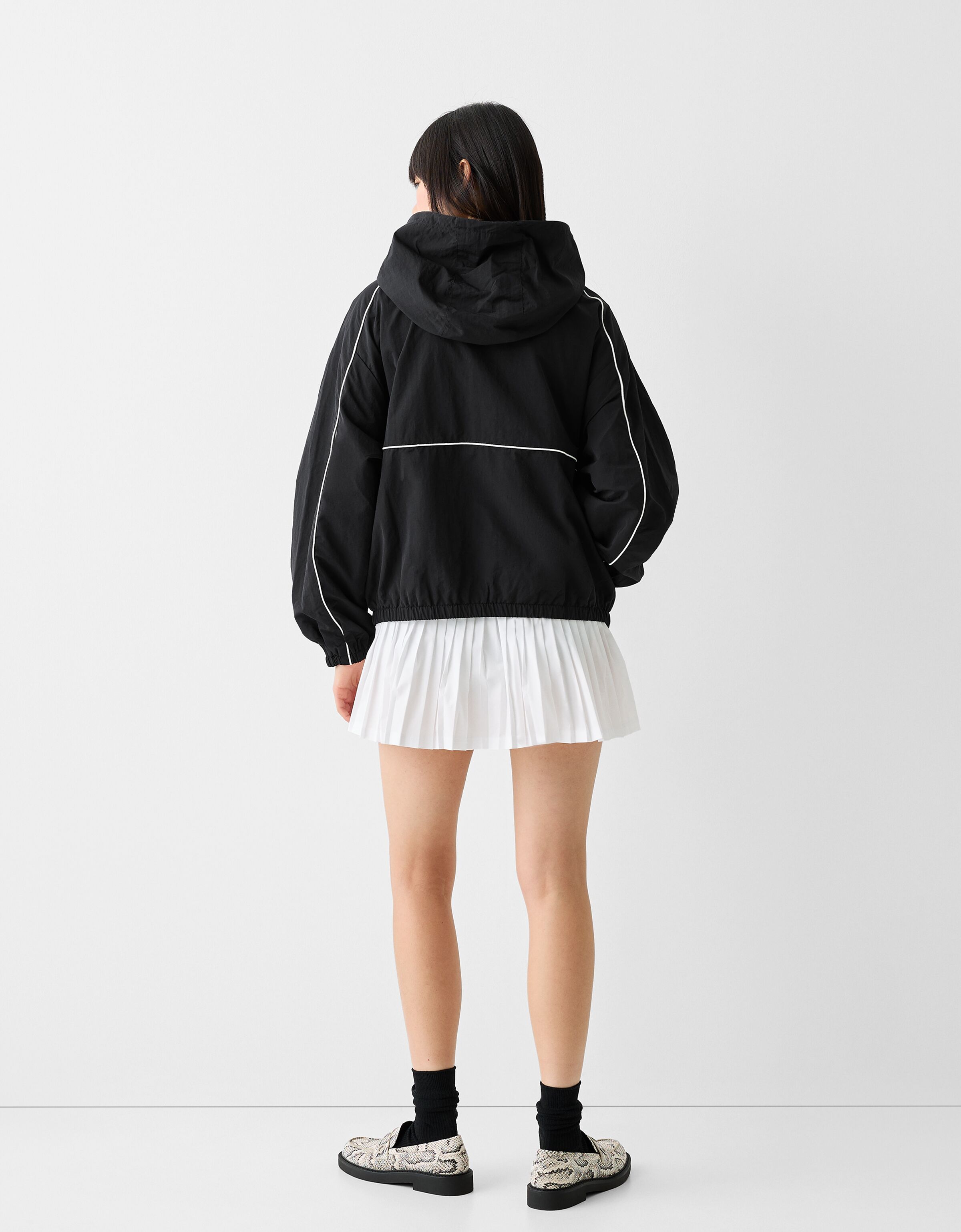 Black jacket with white hood top