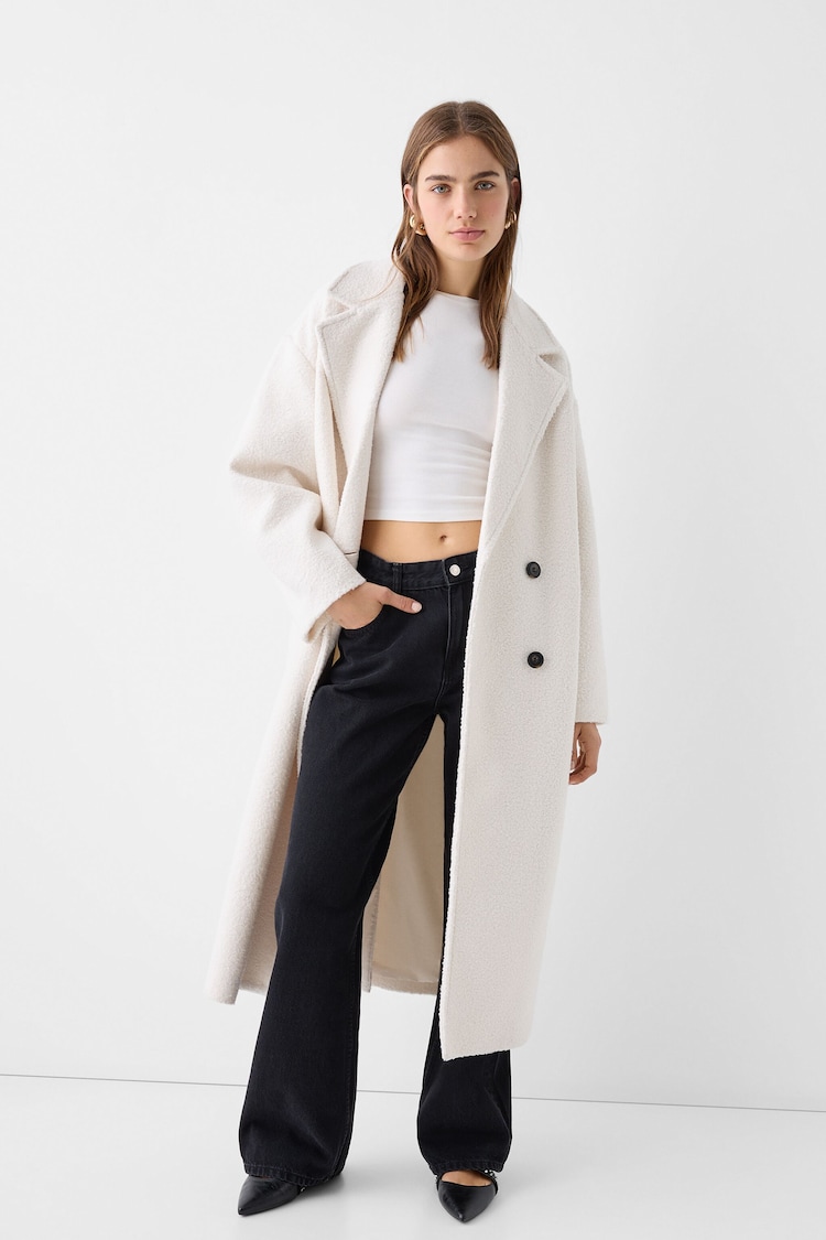 Long double-breasted double-buttoned bouclé coat