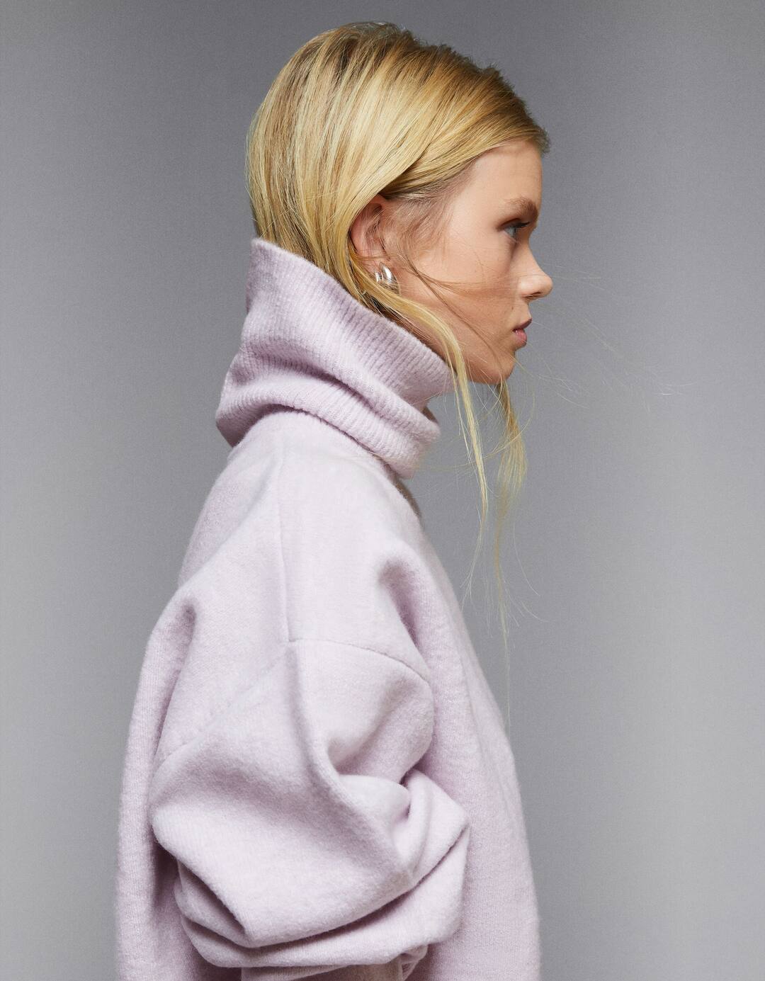 Raised neck jumper