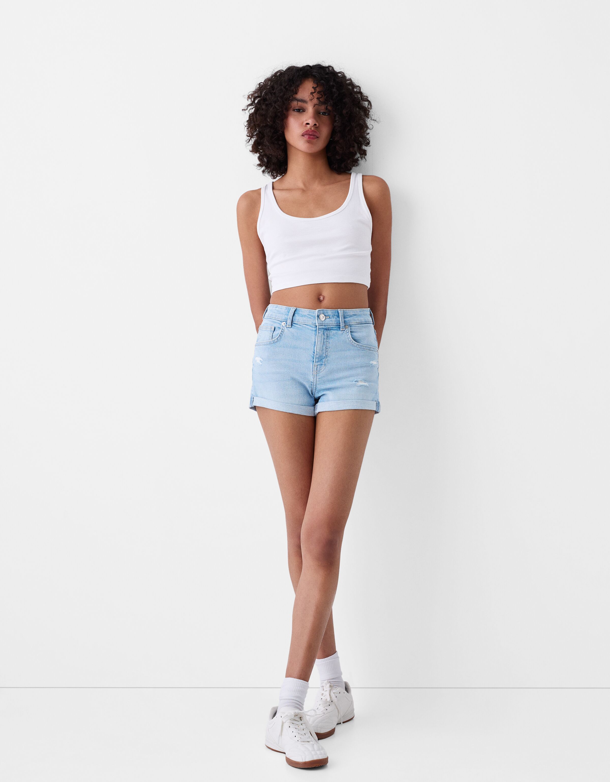 Roll up denim shorts Skirts and Shorts BSK Teen Bershka