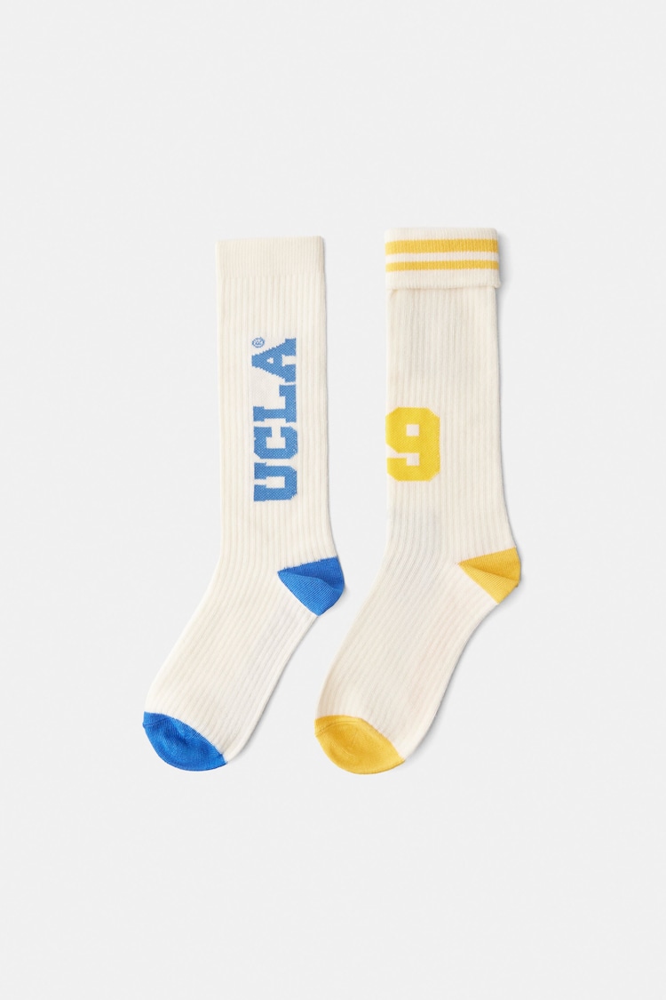 2 UCLA rašto kojinių porų rinkinys