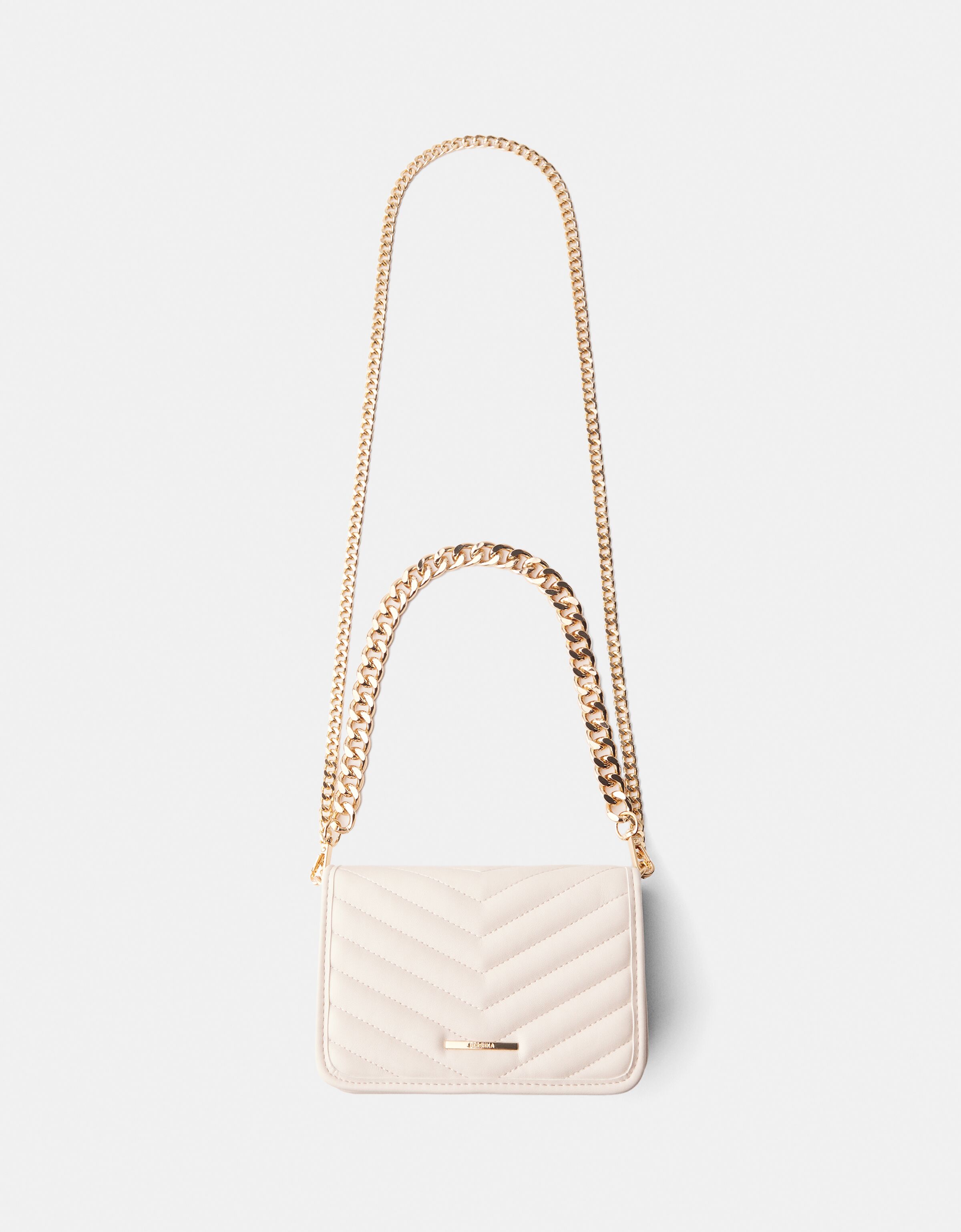 White quilted bag online chain