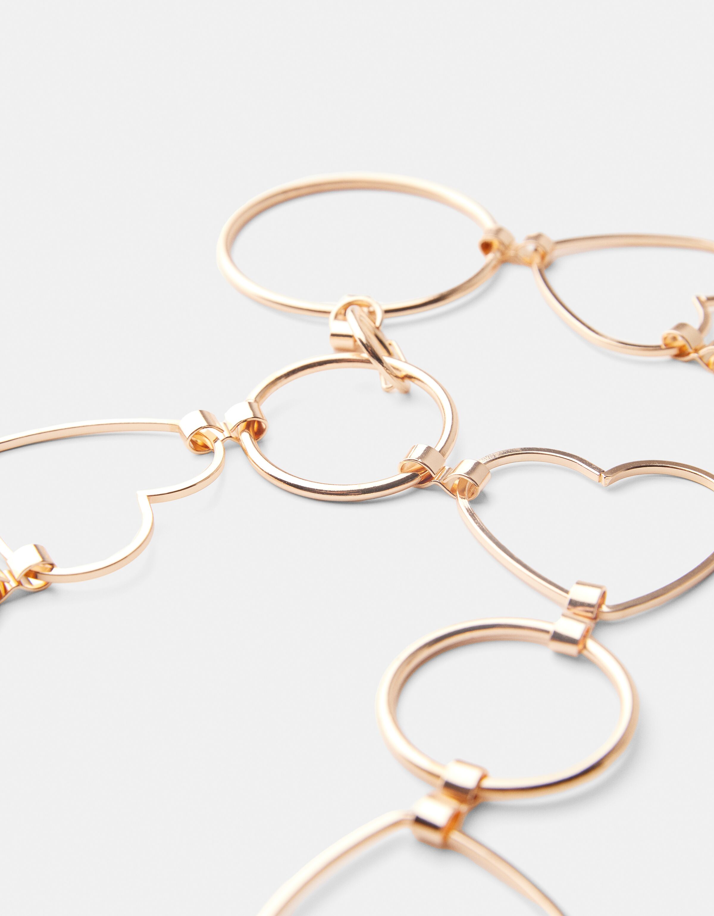 Heart chain clearance link belt