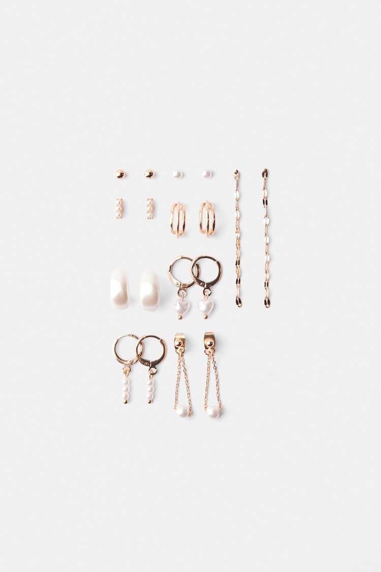 Set of 9 cascade faux pearl heart earrings