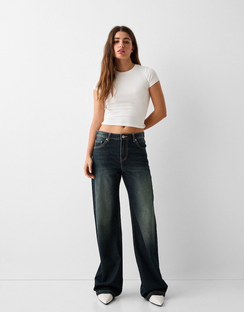 Bequeme Jeans-Schlaghose mit seitlichem Schlitz - Hosen - BSK Teen