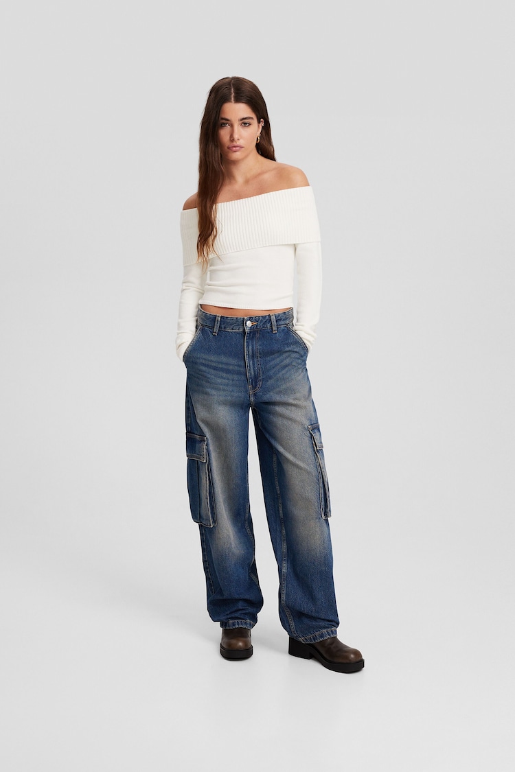 Skeiteru stila džinsi ar uzšūtām kabatām