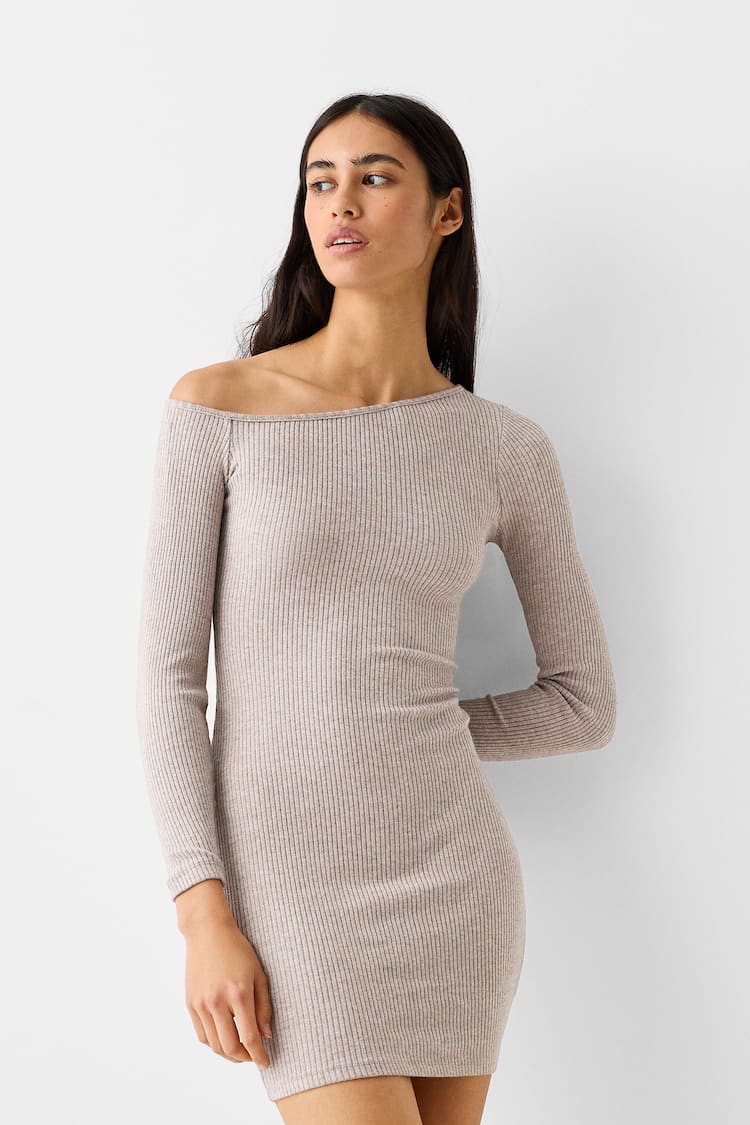 Long sleeve knit mini dress with an asymmetric neckline