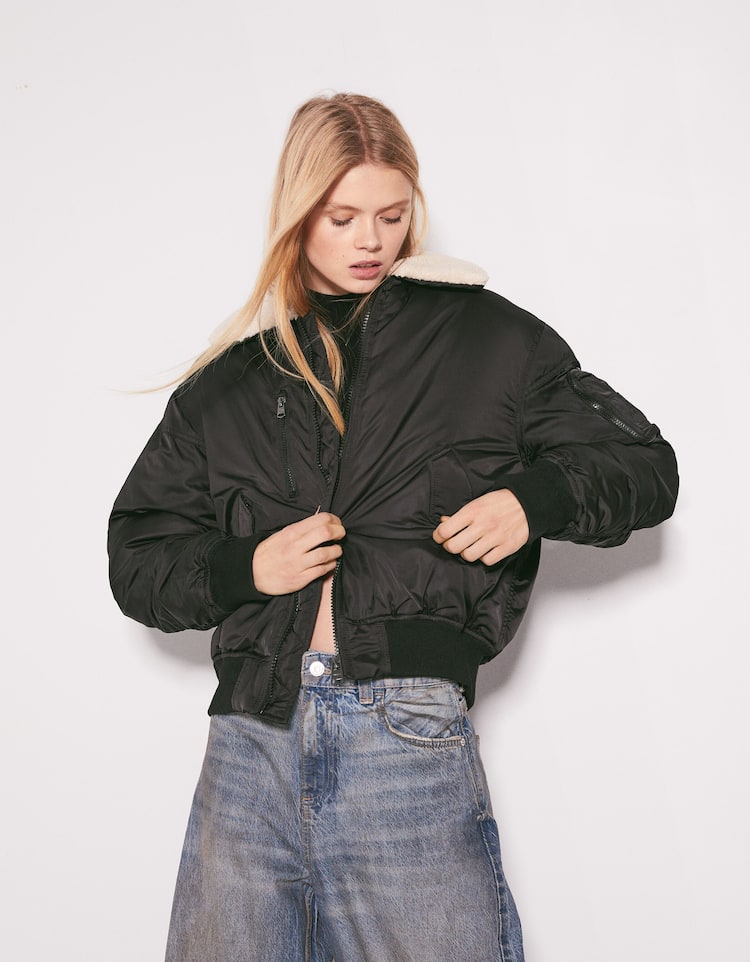 Bomber jacket with faux shearling
