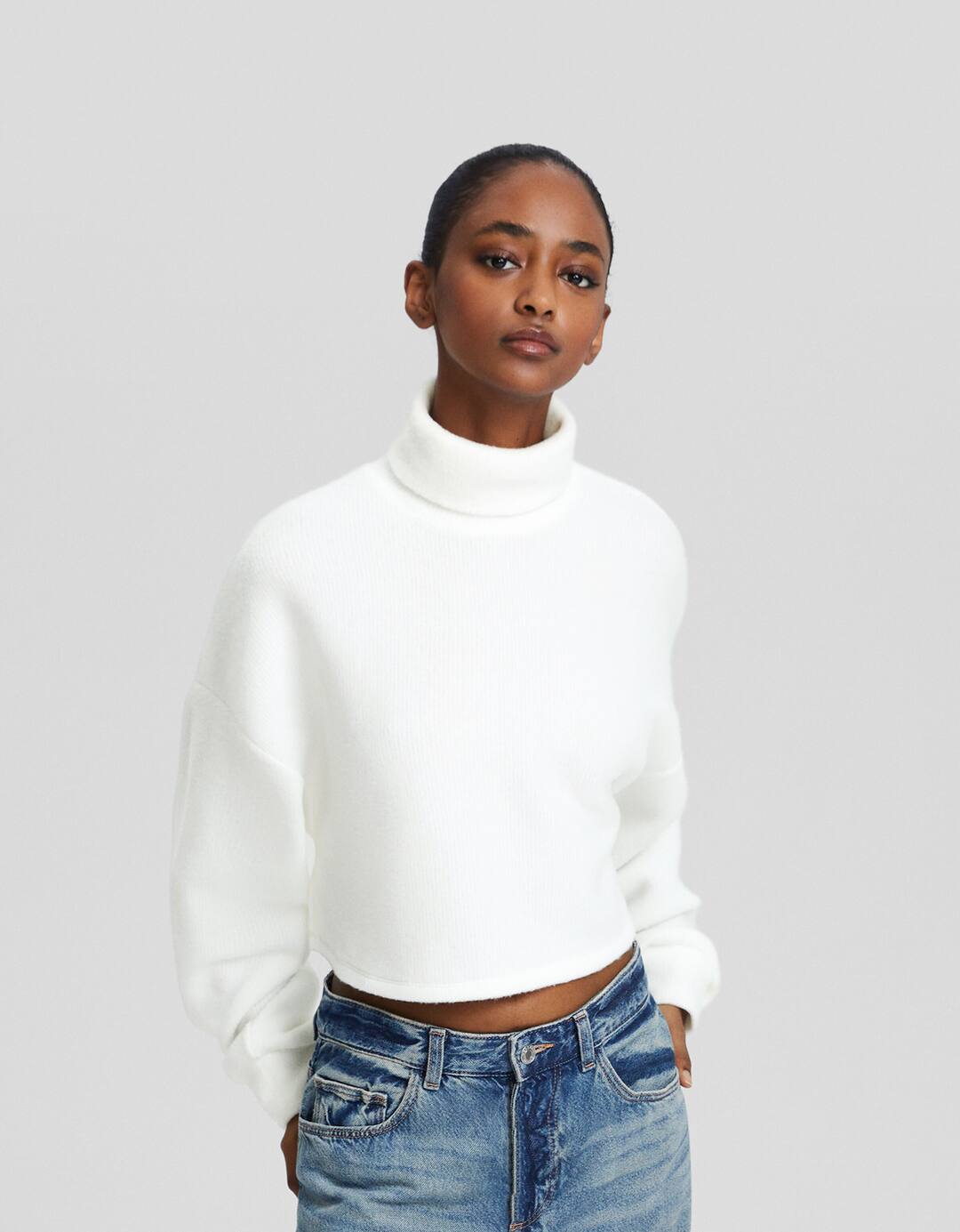 Raised neck jumper