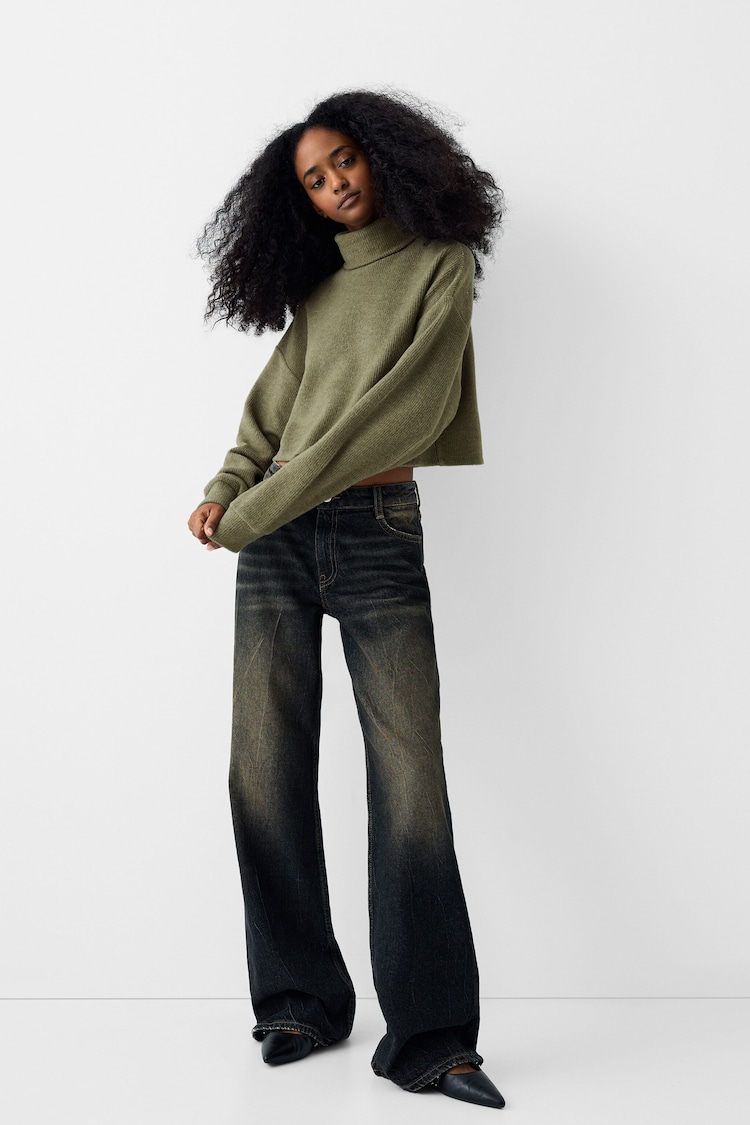 Cropped sweater with a high neck