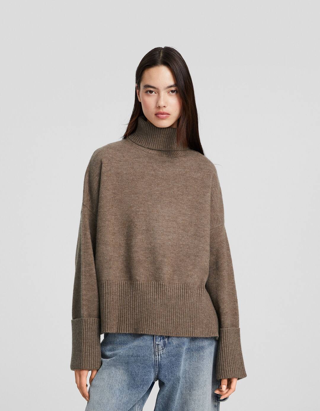 Raised neck jumper