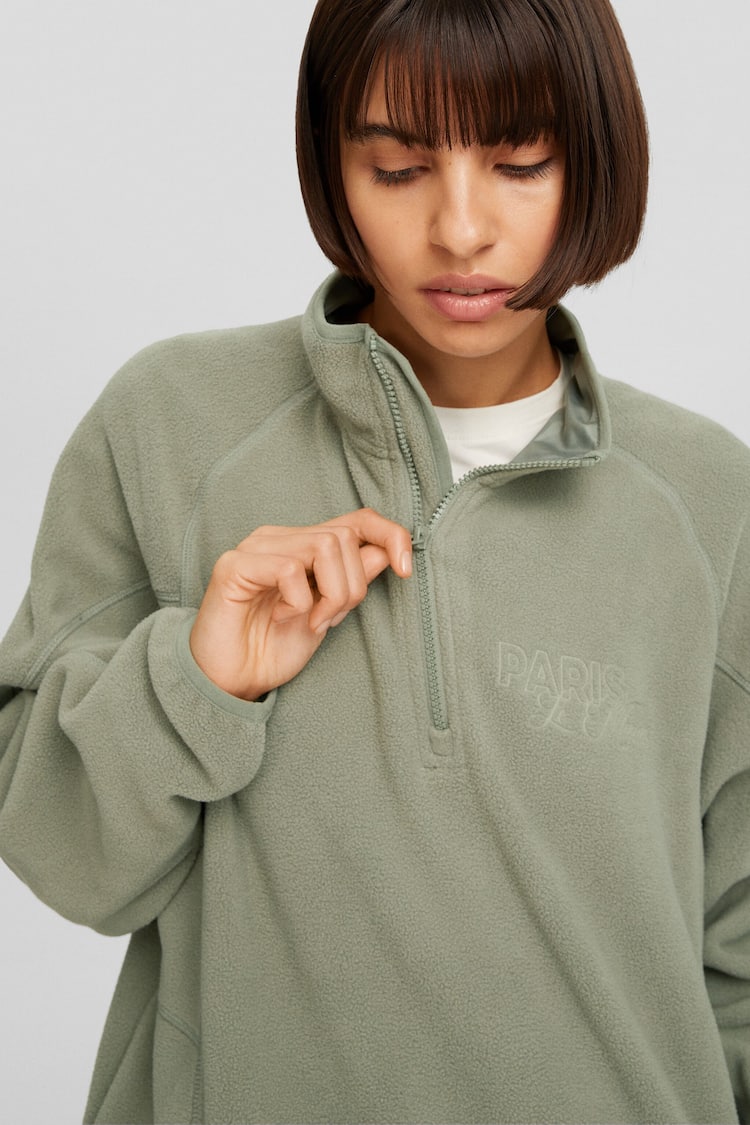 Embroidered zip-up fleece sweatshirt