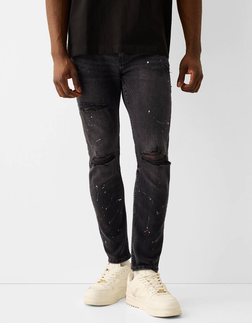 Ripped paint splatter skinny jeans - Men | Bershka