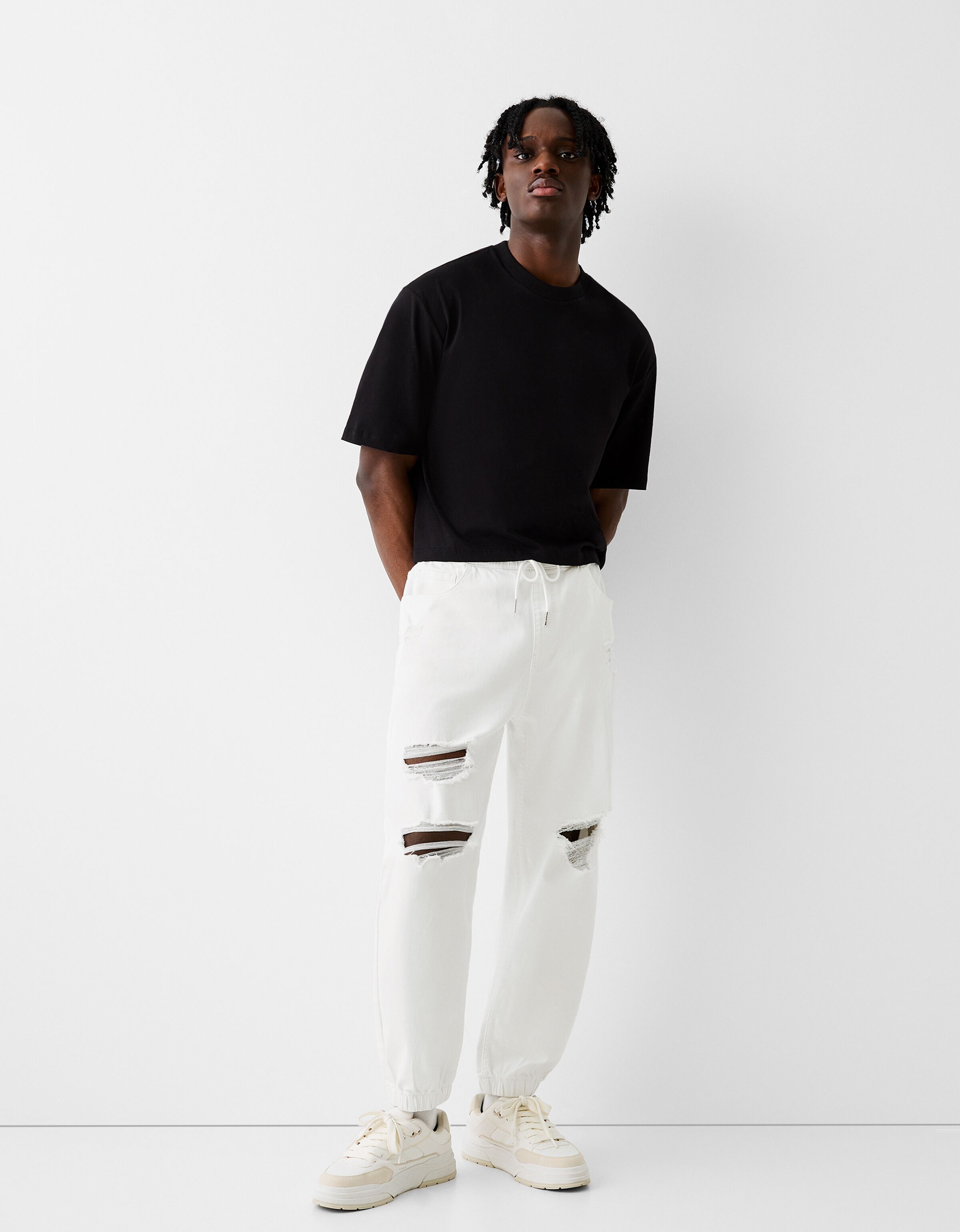 White ripped online sweatpants