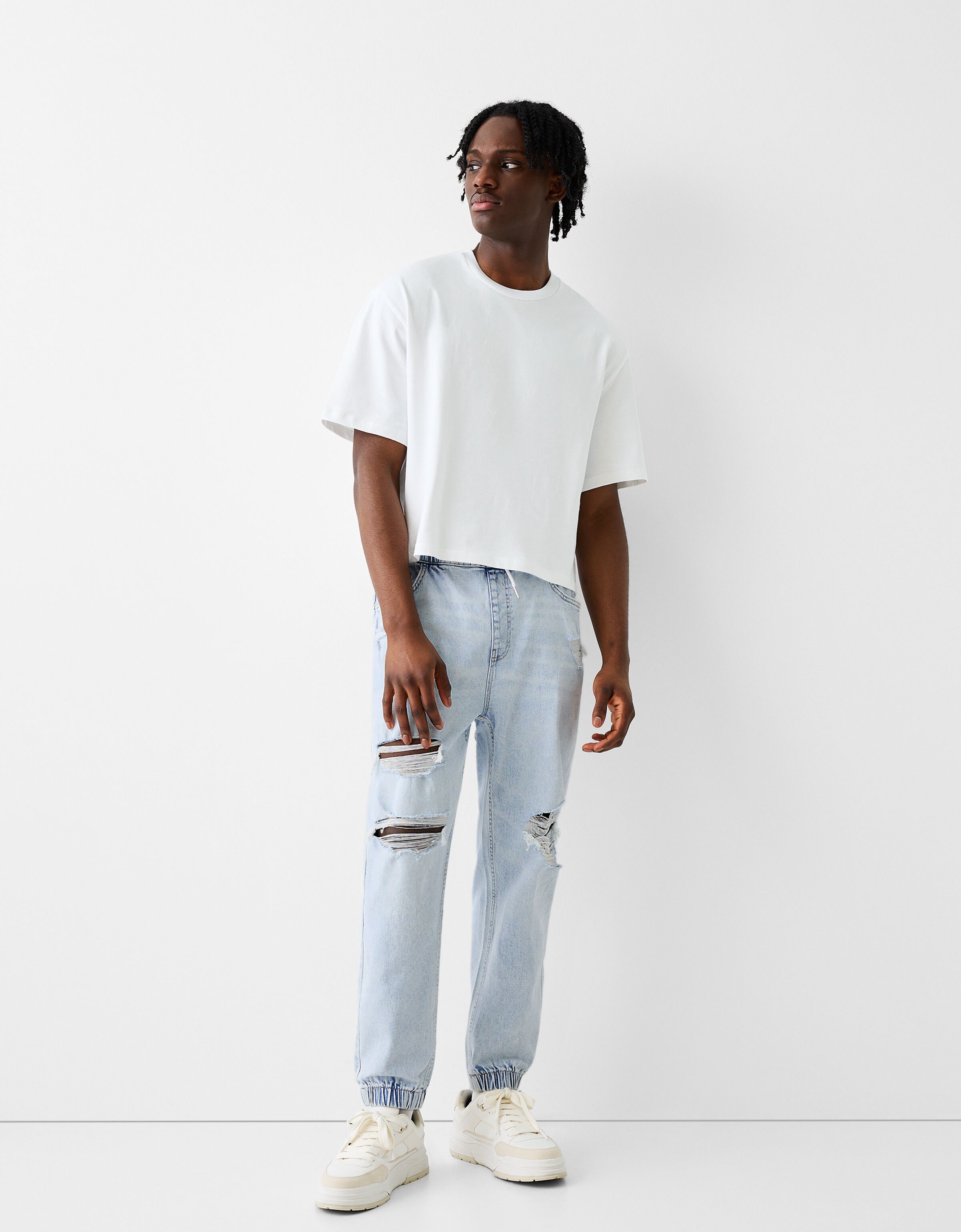 White cut best sale up jeans mens