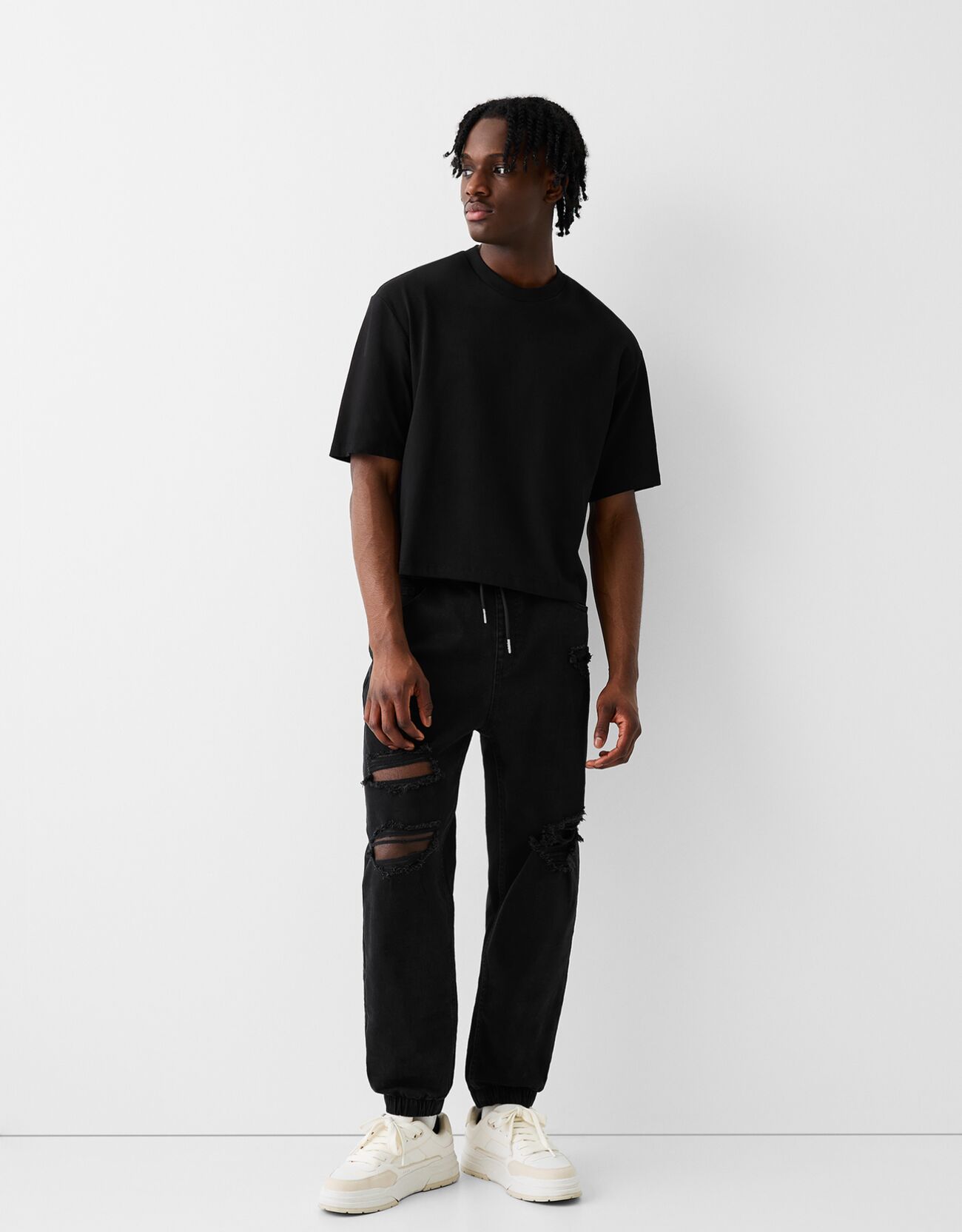 Black ripped 2025 jogger jeans