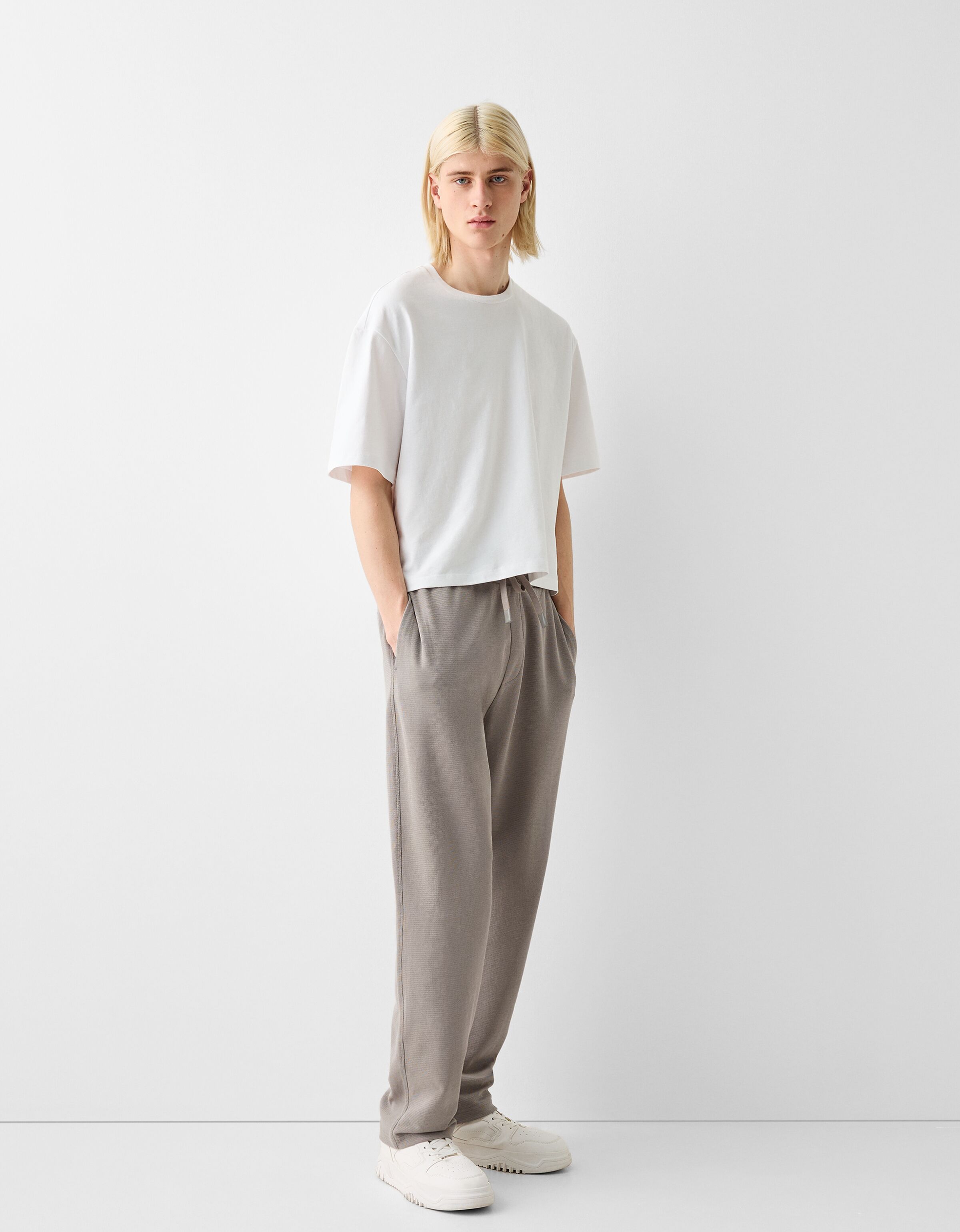 High-rise wide-leg cotton pants in neutrals - King Tuckfield | Mytheresa