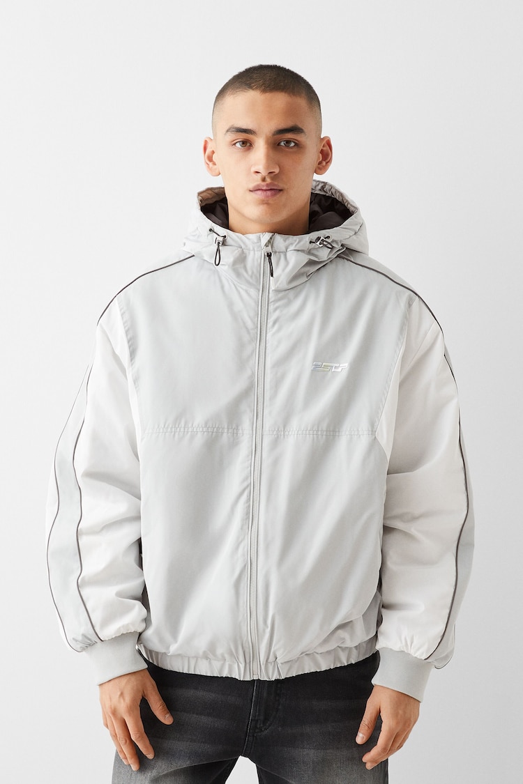 Colour block technical jacket with hood