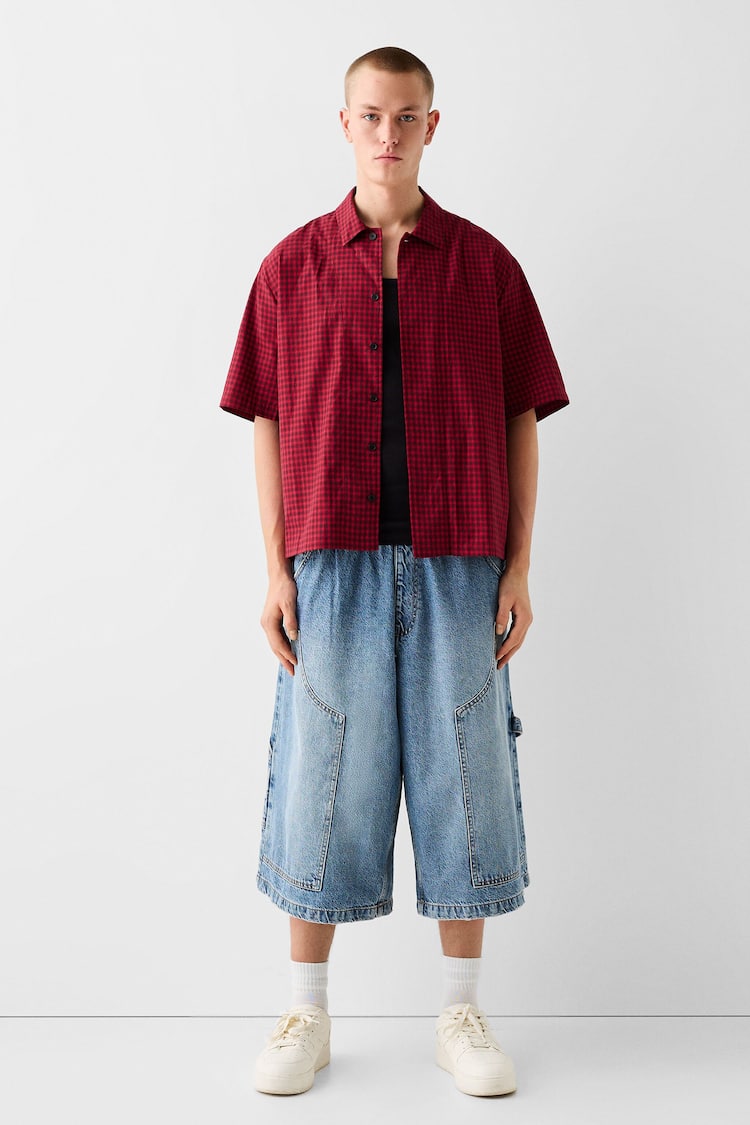 Baggy denim Bermuda shorts with contrast waistband