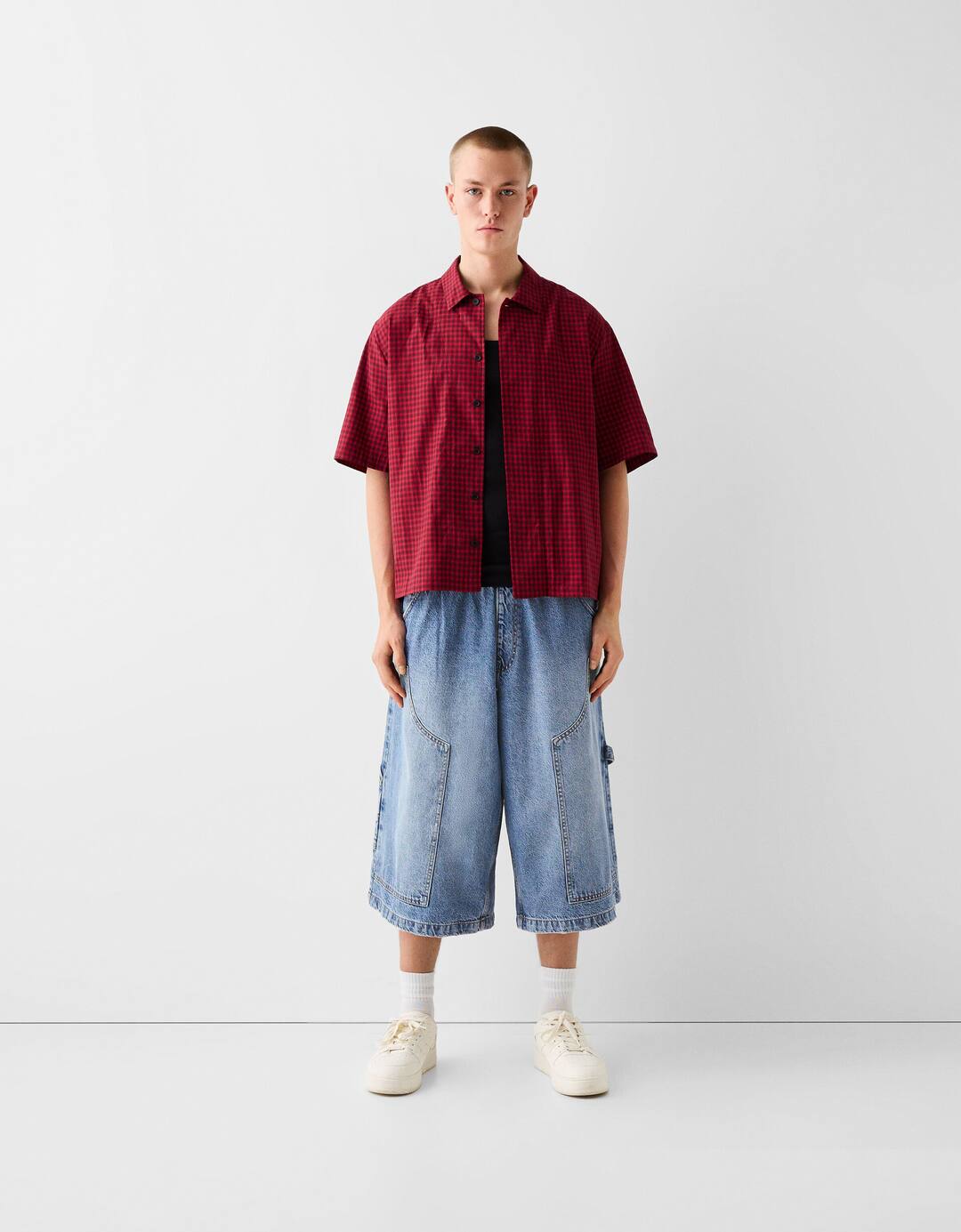 Baggy denim Bermuda shorts with contrast waistband