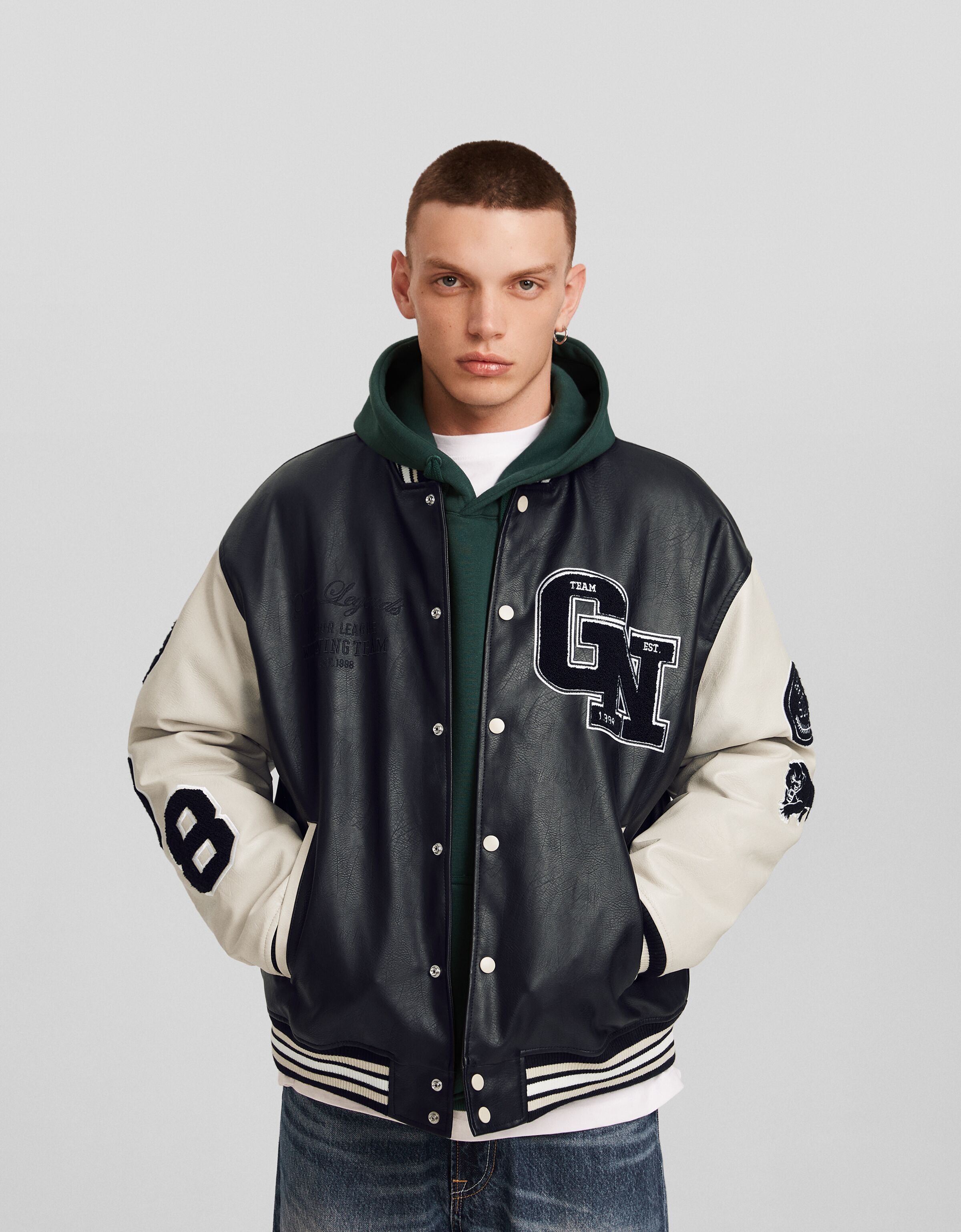 Faux leather varsity jacket top
