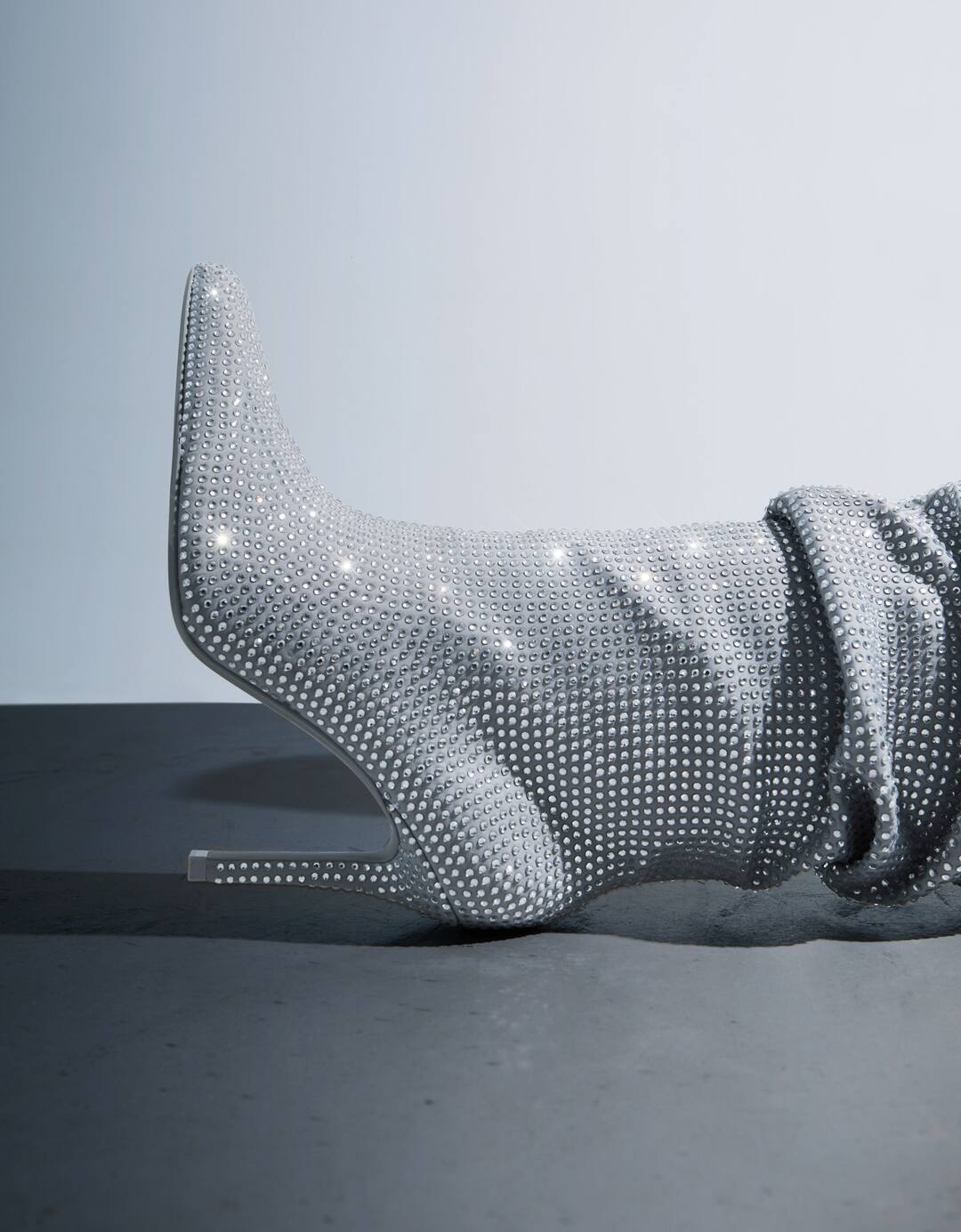 Shiny stiletto-heel boots