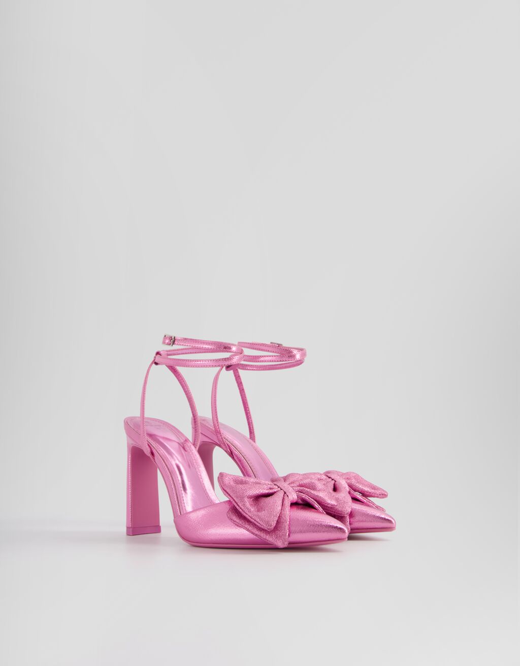 Shiny high-heel shoes with ankle strap and bow - Women | Bershka