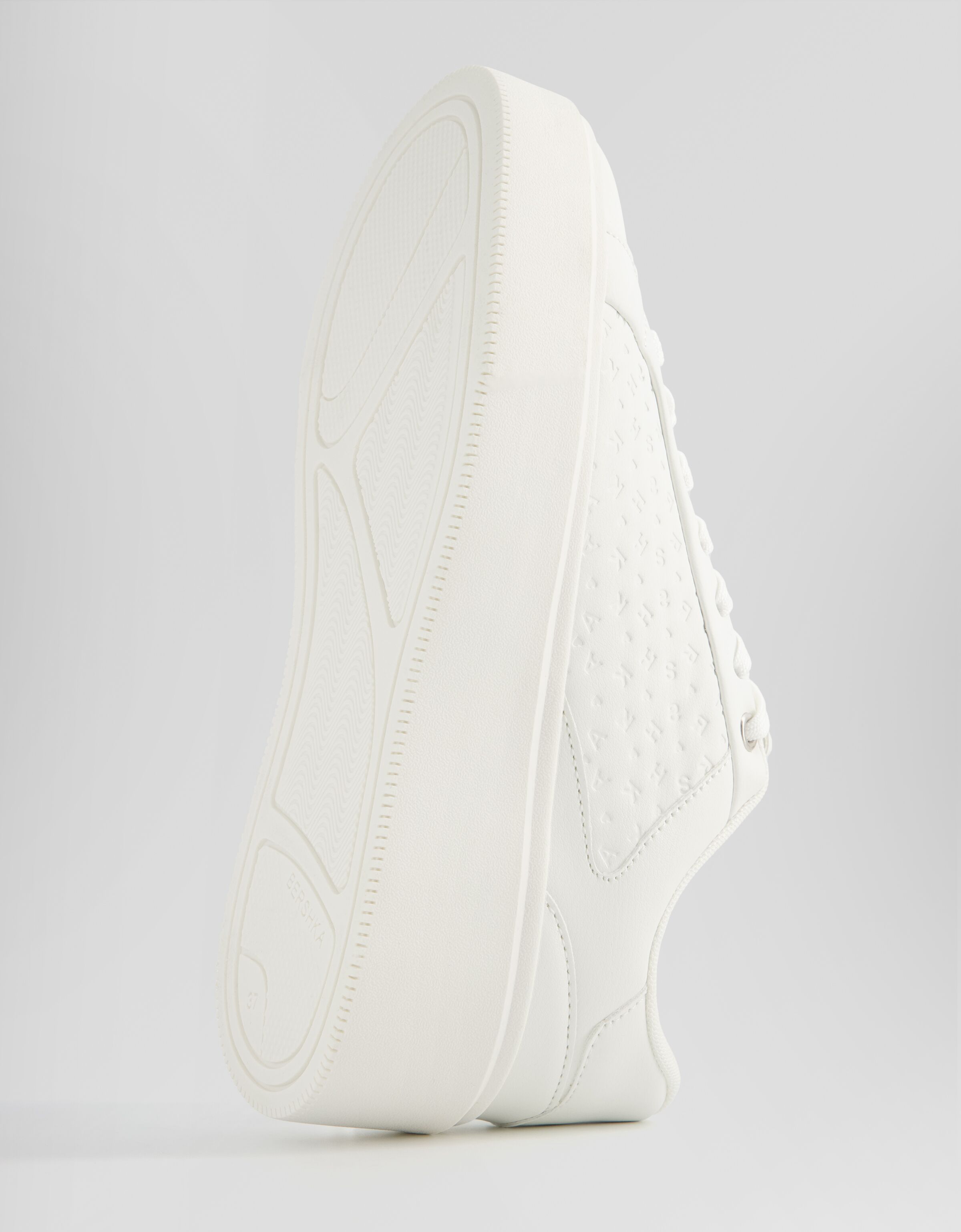 Platform sneakers with embossed letter detail Women Bershka