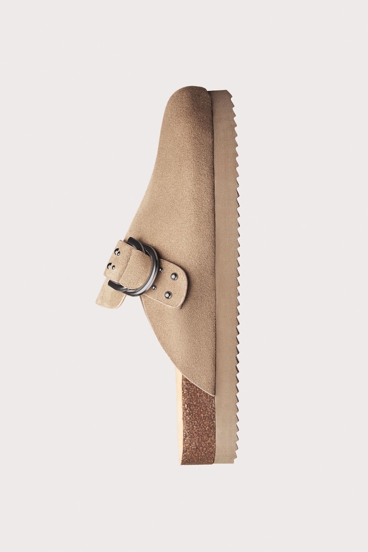 Buckled clogs with stud details