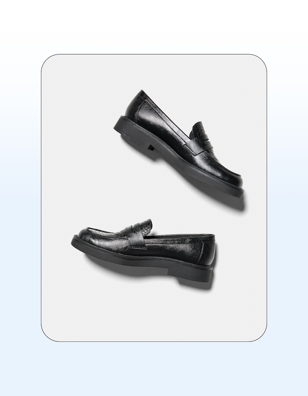 Flat black loafers